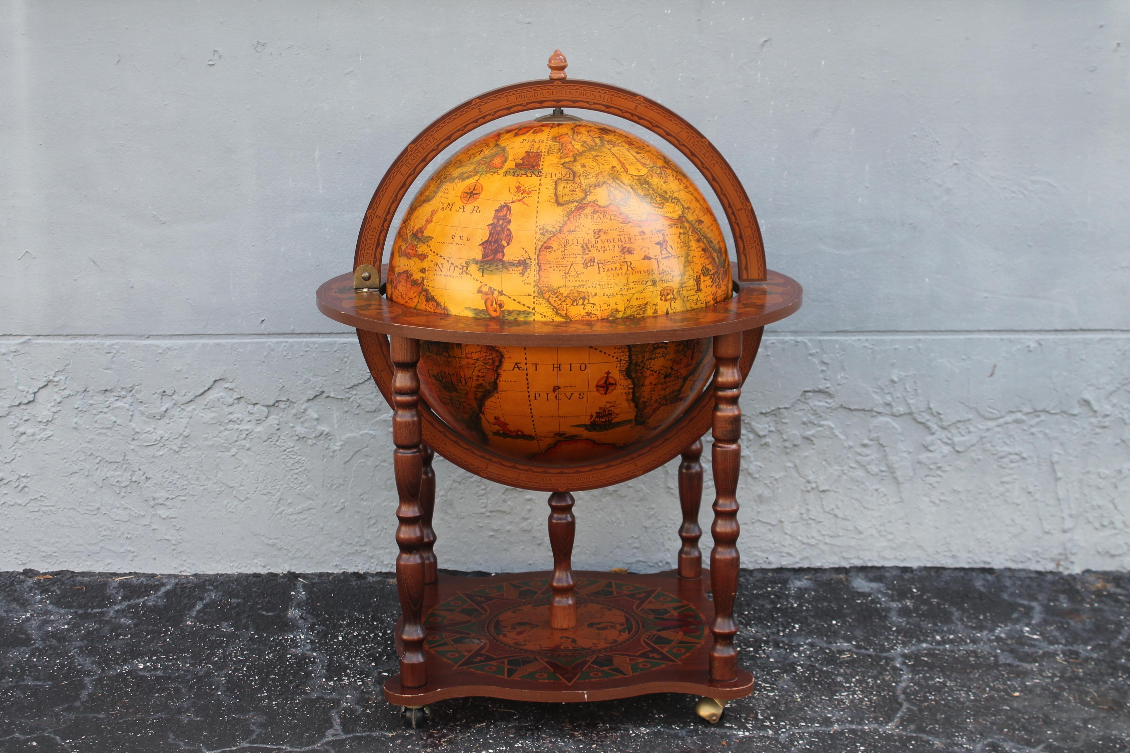 1960's Mid Century Modern World Globe Dry Bar. Very collectable and very decorative. Makes a great dry bar with storage interior.