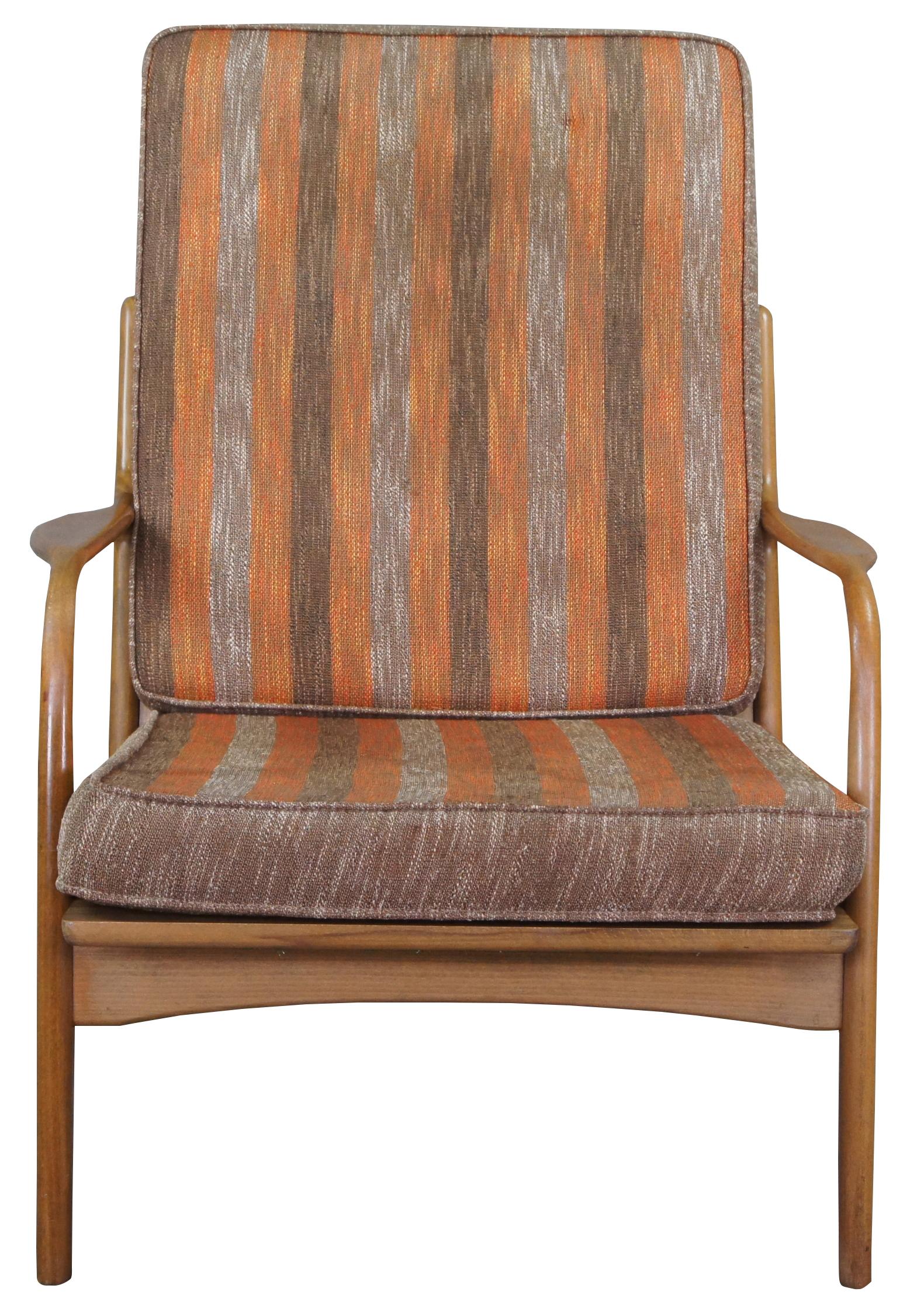 Vintage 1960s Mid-Century Modern arm chair. Made in Yugoslavia with a Danish / Scandinavian inspired crafting.
 