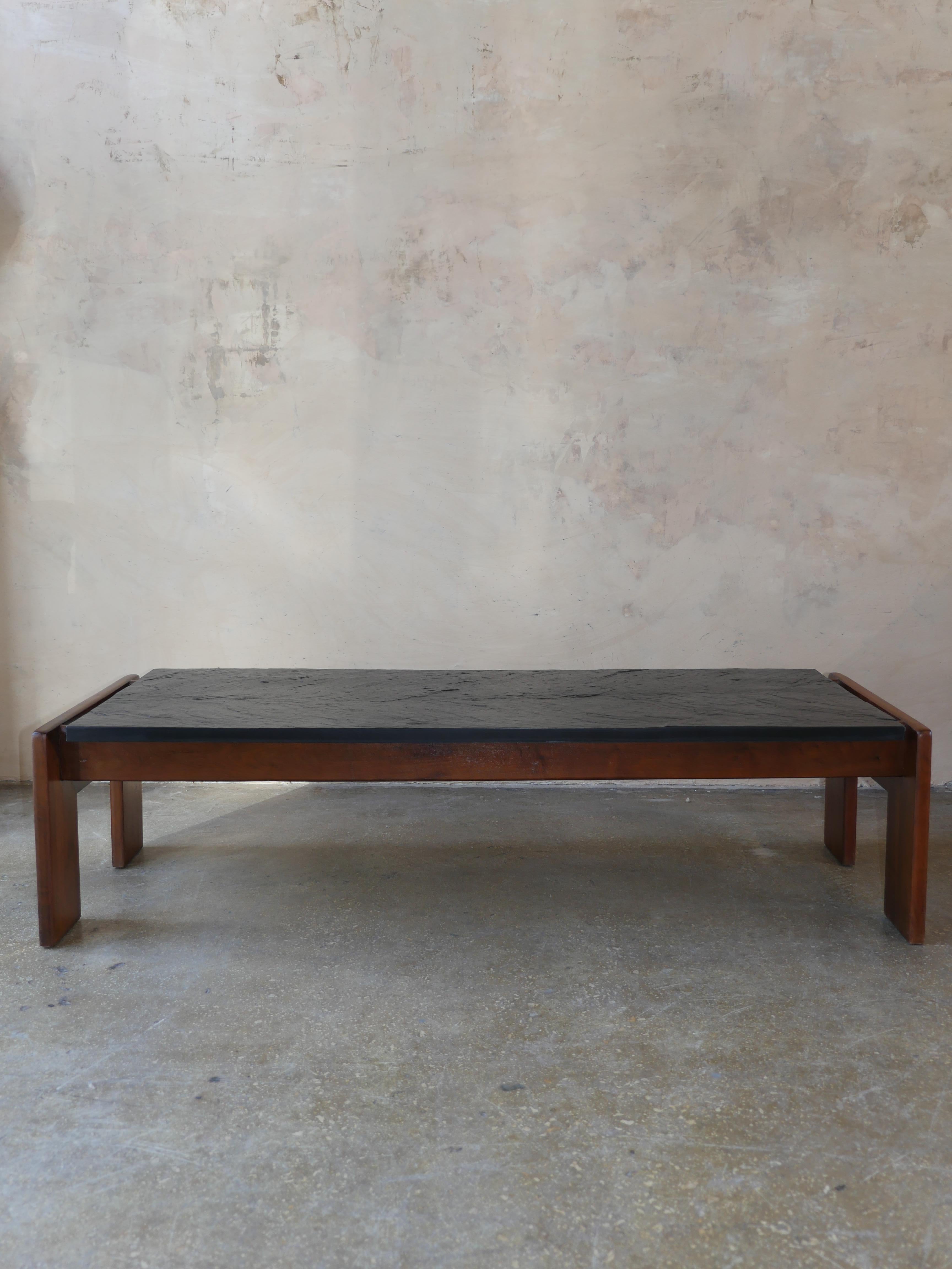 1960s vintage slate and walnut mid-century coffee table, often attributed to Adrian Pearsall and Phillip Lloyd Powell.