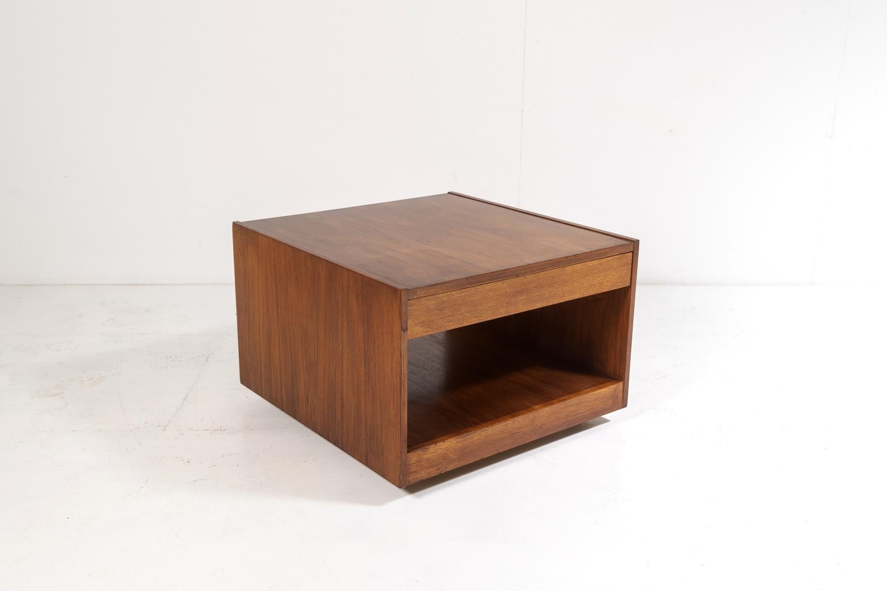 A very good quality mid century teak coffee table or sofa side table in excellent condition.
The square cube shape is a staple of mid century design and this classic piece is a superb example.  A practical item with plenty of space on the lower