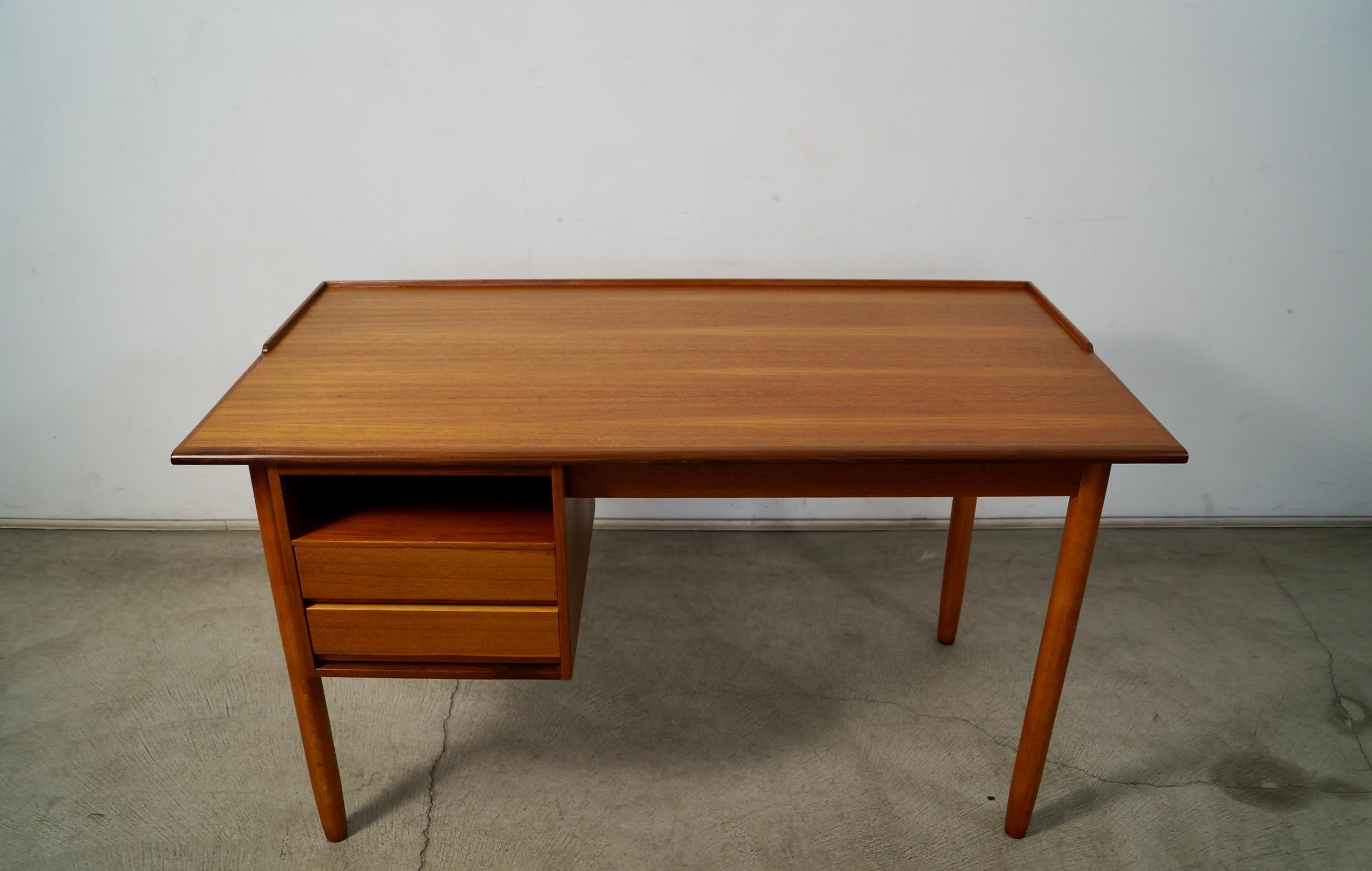 Vintage Midcentury Modern desk for sale. Designed by A.B. Lammhults, and made in Sweden. Has the brand and designer engraved in the teak underneath. Very rare and special desk that has been professionally refinished. It has one open shelf cubby hole
