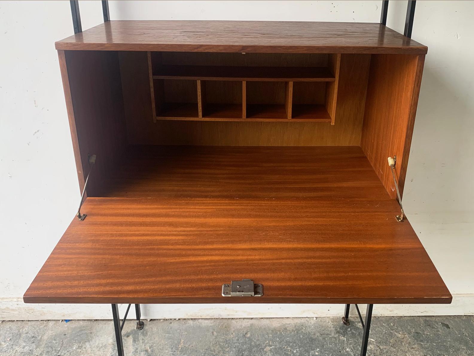 Steel 1960’s mid century teak wall unit with desk unit by Avalon For Sale