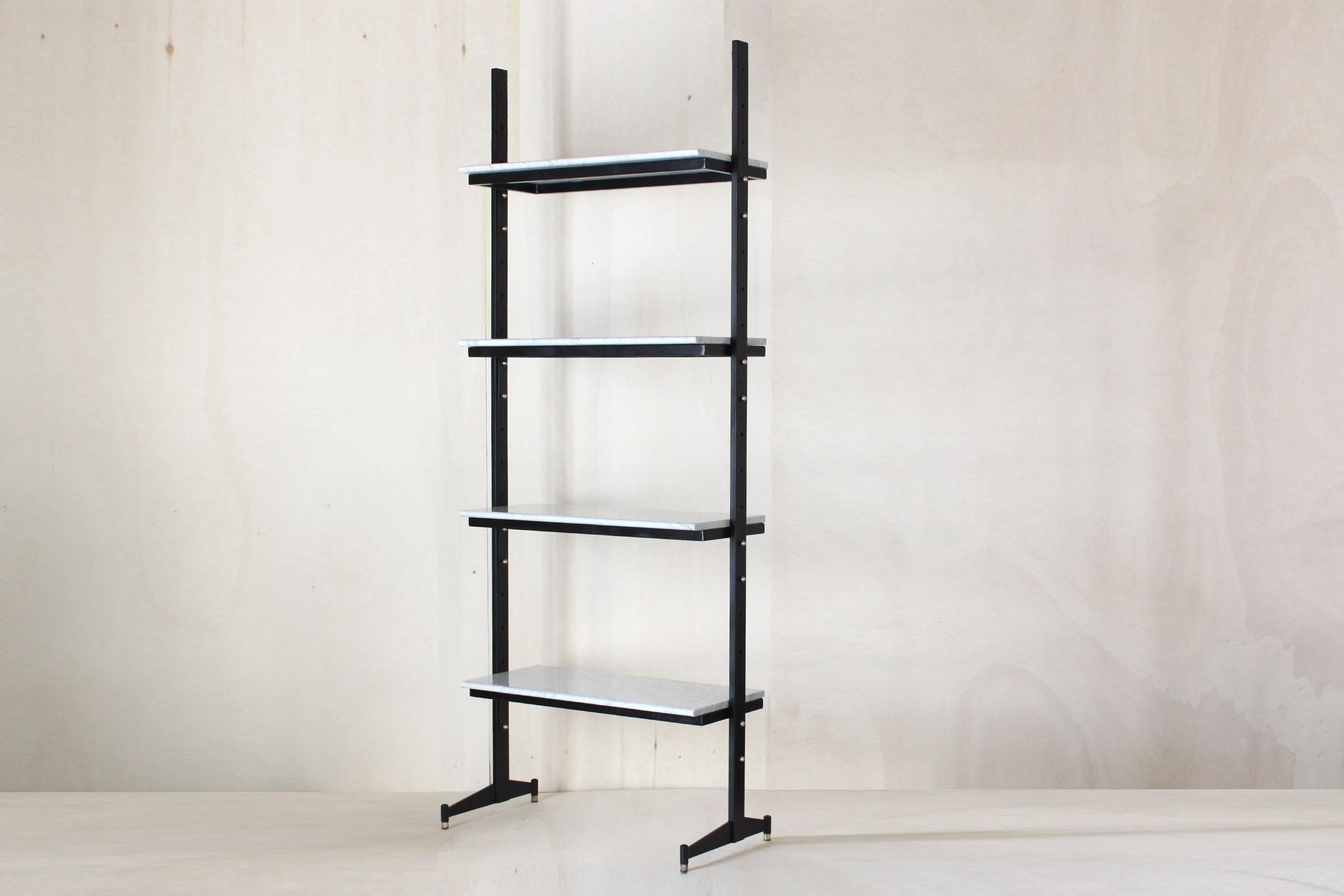 Vintage bookshelf with Carrara Marble shelves, Italy 1960s. 
A rare 1960s Mid-Century Modern style book shelf with Carrara marble shelves and black iron structure. 

The item is in perfect conditions as the Carrara marble has been cleaned, polished