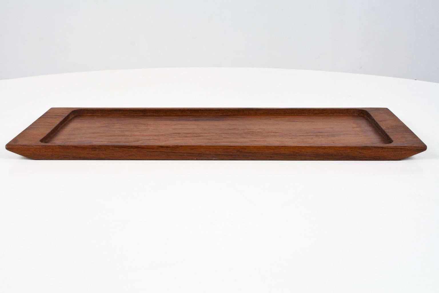 Beautiful Danish 1960s solid teak wooden desk accessory or table tray. To use for pencils, business cards or table and kitchen accessories. 

The inner dimensions of the tray are 28.5 cm x 12.7 cm.