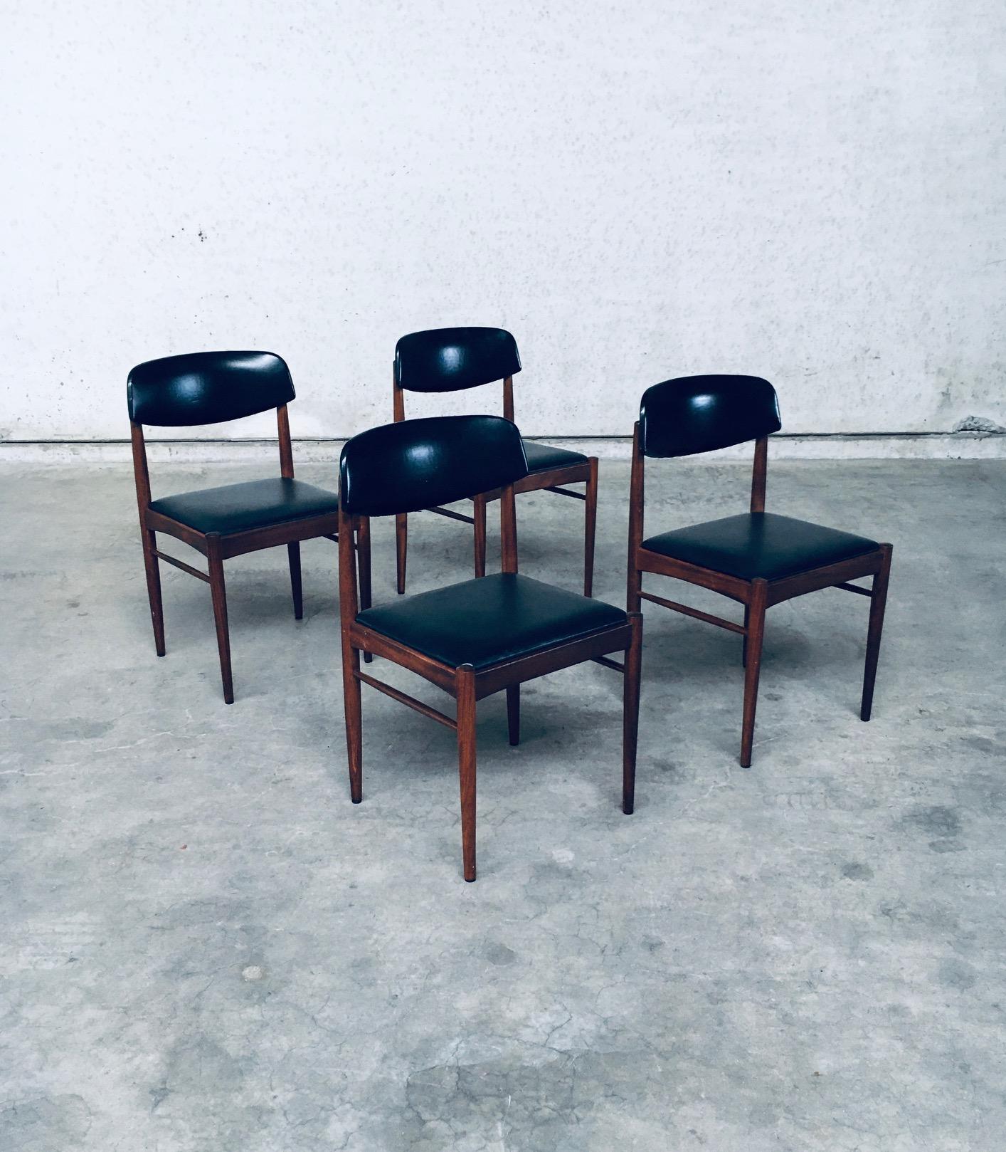 Vintage Midcentury Modern Dutch Design Dining Chair Satz von 4. Hergestellt in den Niederlanden, 1960er Jahre. Teak- oder Wengeholz mit Sitz und Rückenlehne aus schwarzem Skai-Stoff. Schöne Form und sehr gut gemachte Stühle. Alle Stühle sind in sehr