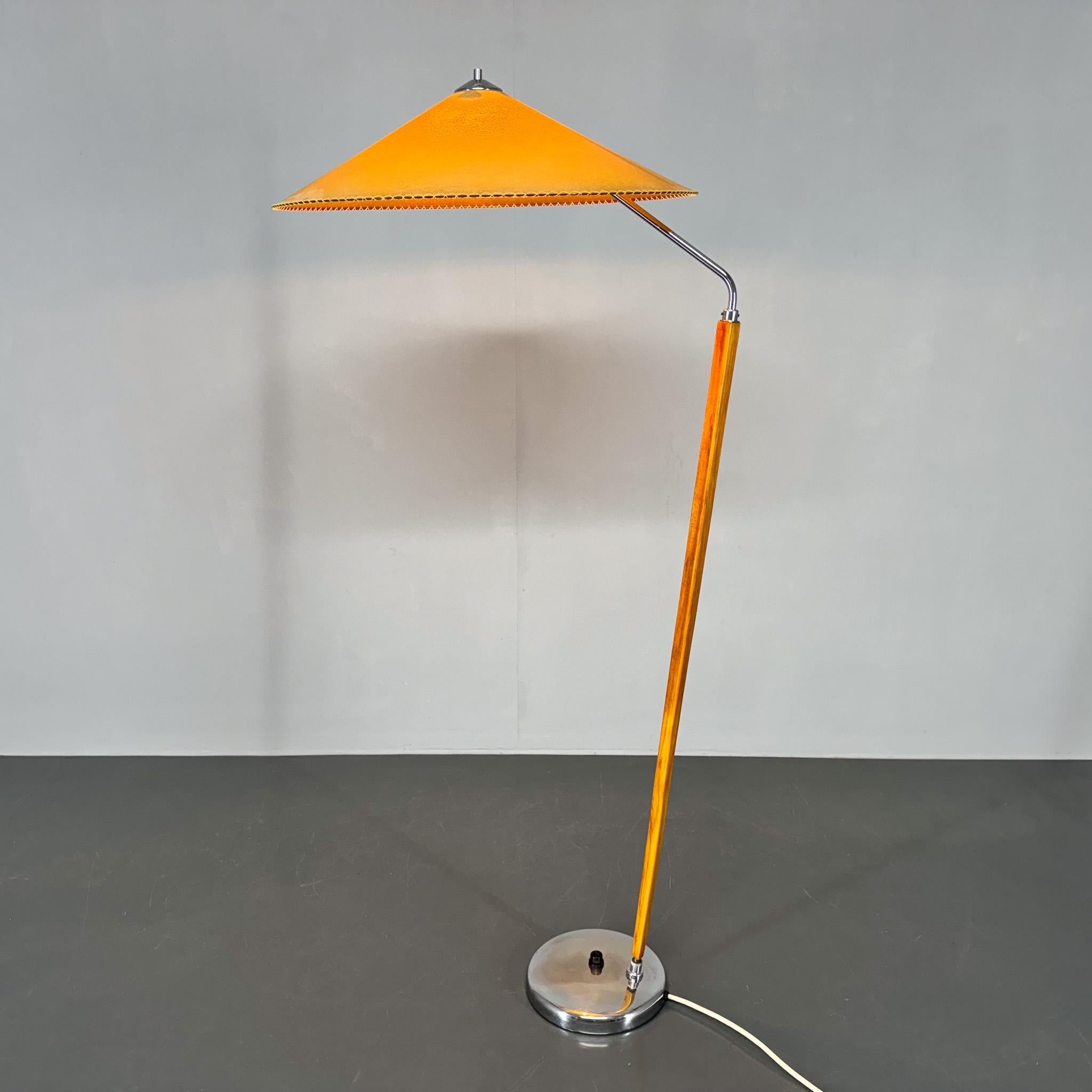 Iconic Zukov floor lamp made in former Czechoslovakia in the 1960s.
The lamp has new large parchment shade.
2x40W, E26(E27) bulbs.
US plug adapter included.