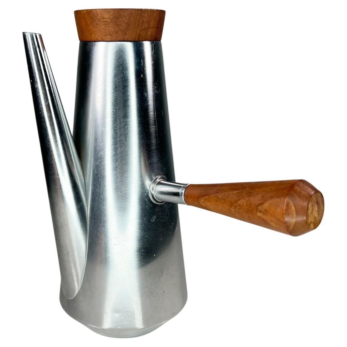 1960s Style of Kalmar Modern silver stainless steel coffee pot tea kettle with conical body, teakwood accent and brand stamp at underside. 
Maker stamped underneath: Made in Italy.
Measures: 9 tall x 8 wide x 5 depth.
Original vintage condition.