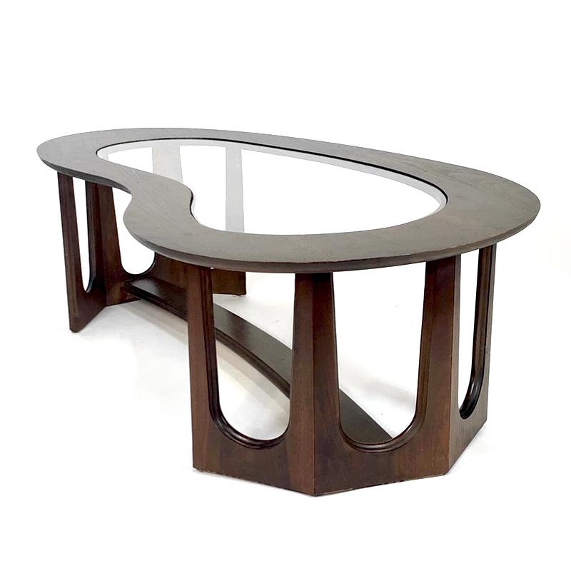 Gorgeous 1960s American made biomorphic table with a gorgeous amoeba shaped glass insert. Lovely sculptural design perfect for any mid century or contemporary interior.