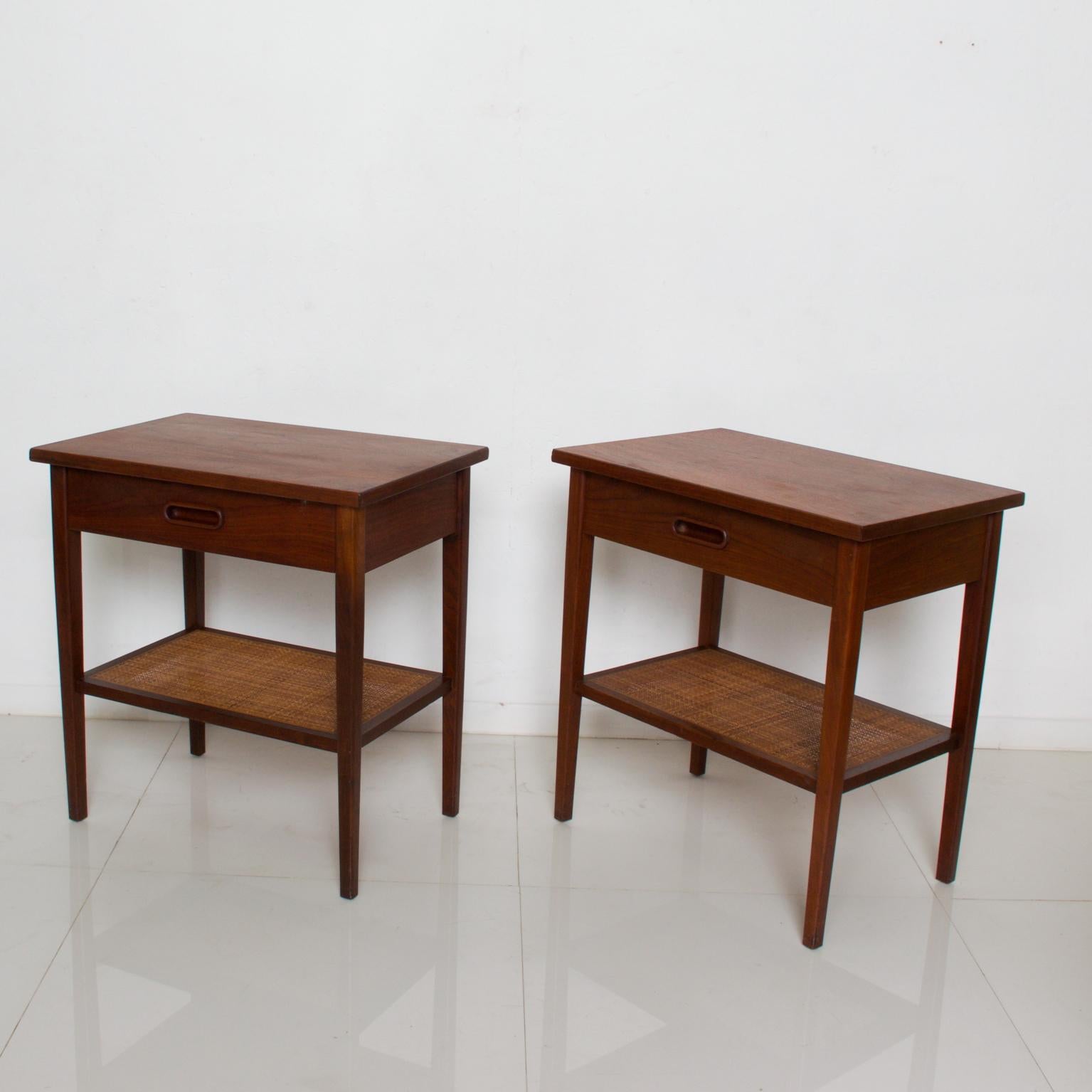 Nakashima style Mid-Century Modern walnut wood night stands side tables, 1960s, USA
Exquisite wood grain and craftsmanship.
Simplicity defined. Lower ledge in cane weave. Double dovetail joinery. No signature present.
Dimensions: 23 3/4