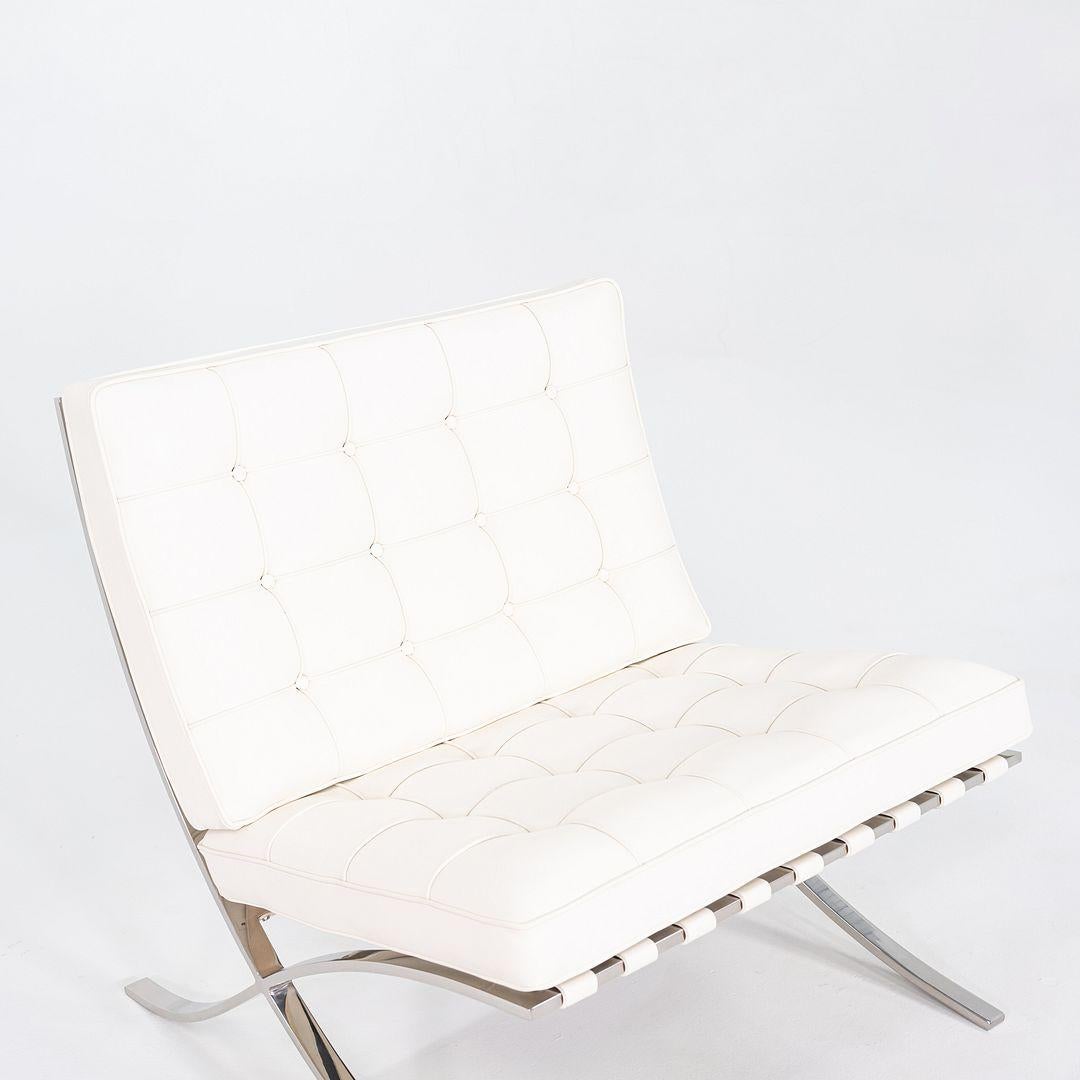 This is a fully restored Barcelona Lounge Chair, originally designed by Mies van der Rohe in 1929. This particular example was produced by Knoll in the USA and dates to the 1960s. The frame is solid and freshly re-polished stainless steel, which was