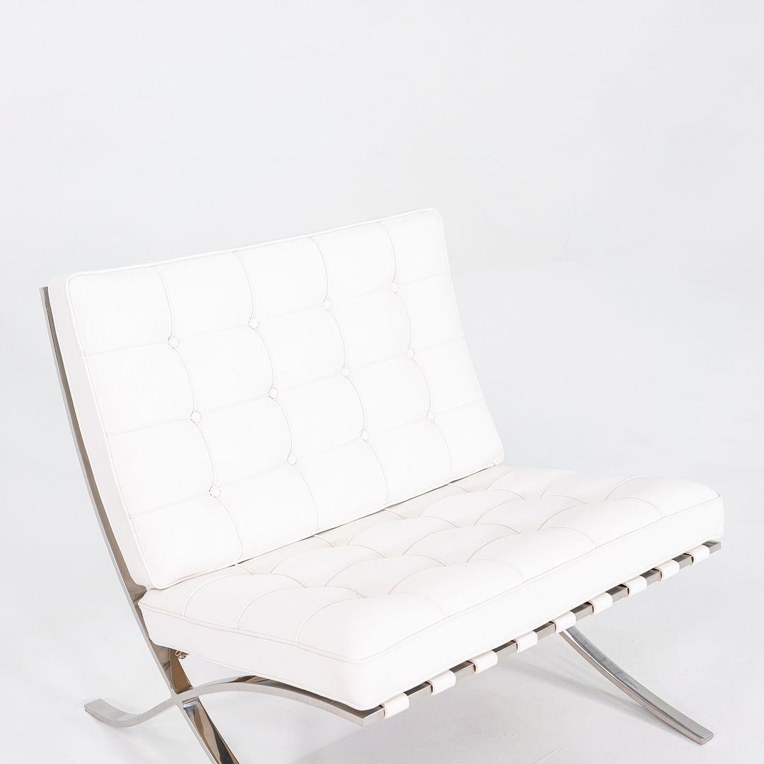This is a fully restored Barcelona Lounge Chair and Ottoman, originally designed by Mies van der Rohe in 1929. This particular example was produced by Knoll in the USA and dates to the 1960s. The frame is solid and freshly re-polished stainless