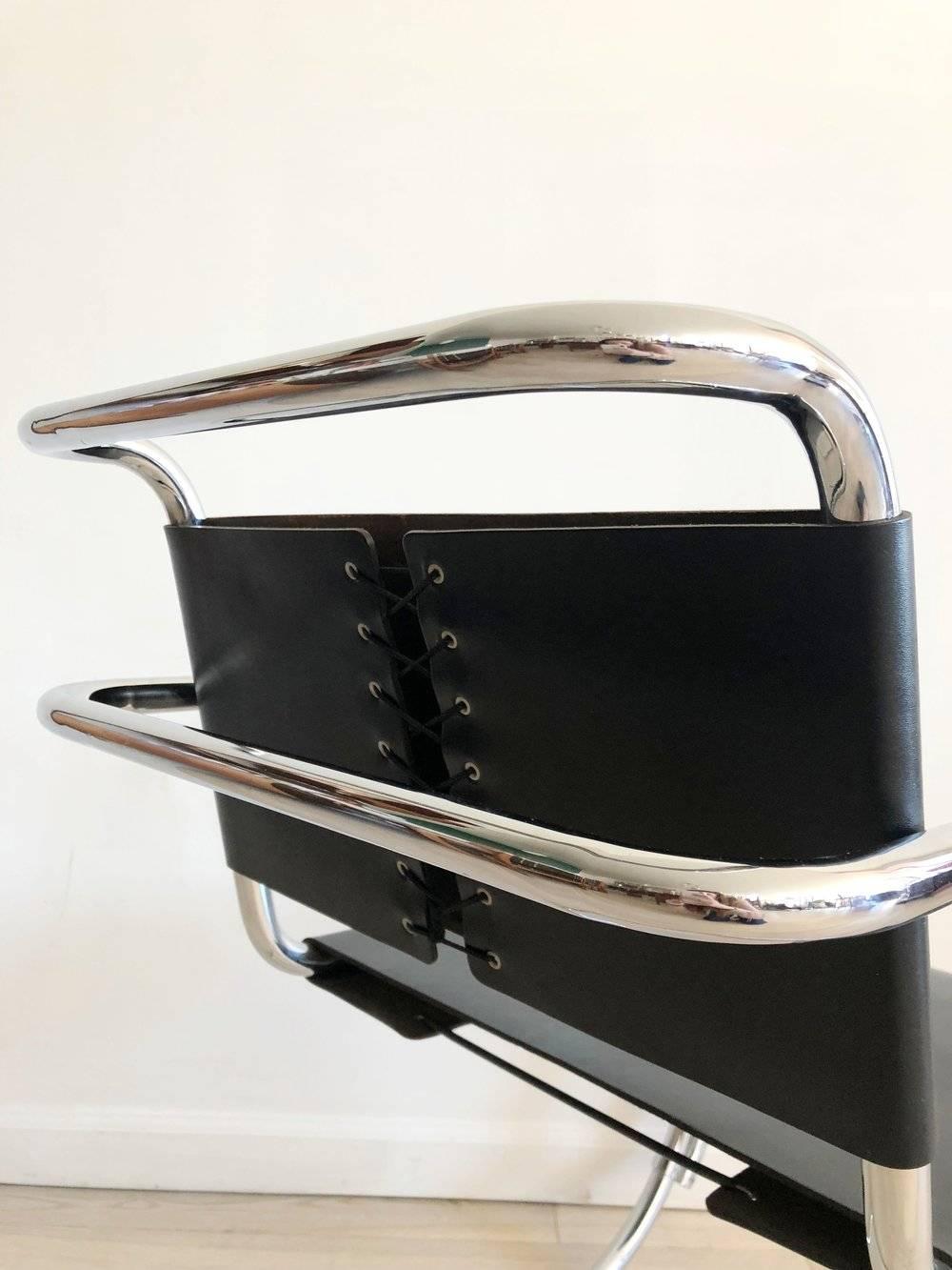 Pair of 1960s MR chair designed by Mies van der Rohe. Imported to America from Stendig. Excellent vintage condition. Corset back leather and shiny tubular bent chrome. Sold as a pair of two armchairs. Made in Italy. Sticker still attached to