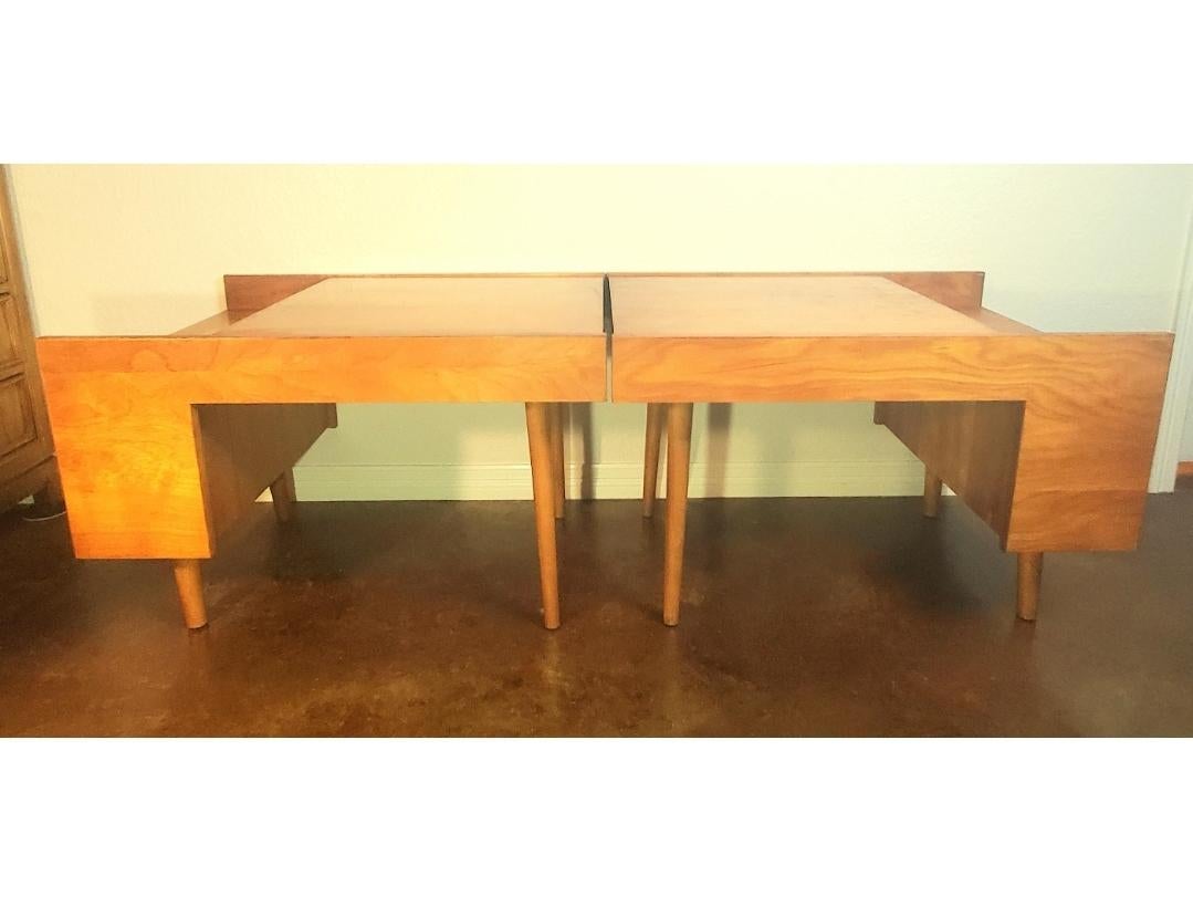 This is a great pair of Milo Baughman designed end tables for Glenn of California with a magazine shelf and book cubby.
Numbers 26 and 30
Classic mid century design. 
Functional.
Space age.
Bauhaus. 
These have not been restored. They maintain the