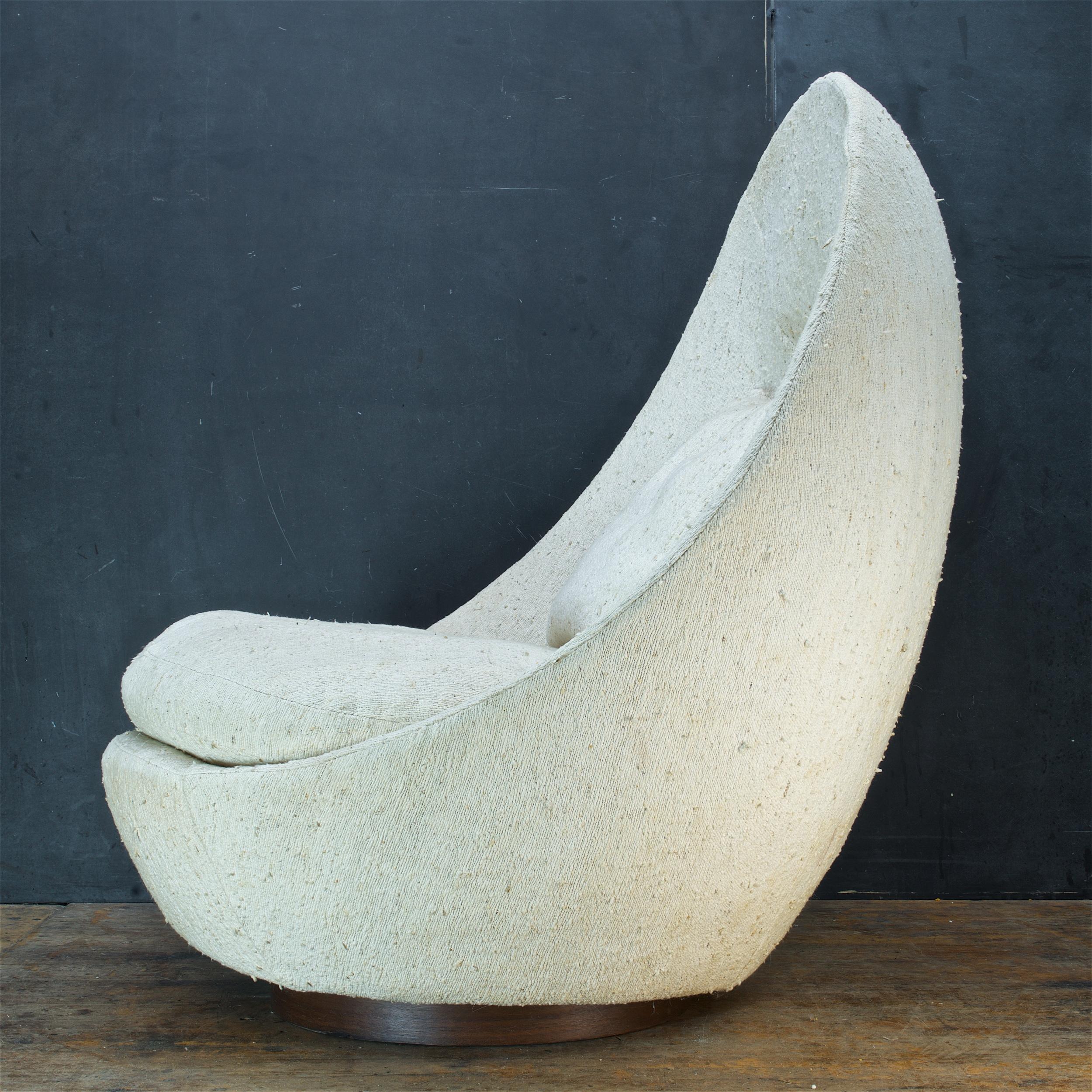 Huge rocking egg chair by Milo Baughman for Thayer Coggin Inc. Has a Tilt Swivel Base Mechanism, or Rocking Swivel.

Old original upholstery, cushions are still soft, no hard foam emissions. So this could be used as is, but we would recommend