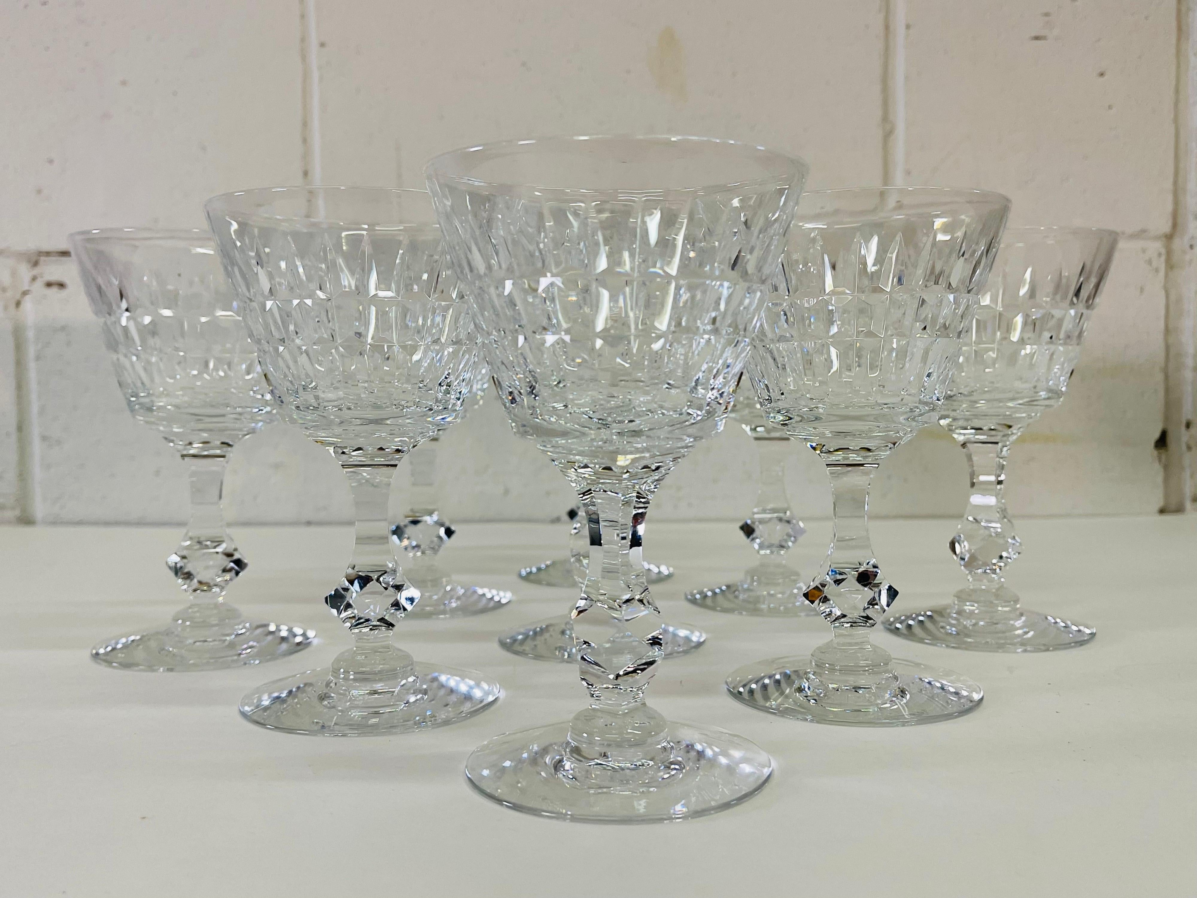 Vintage 1960s set of nine heavy crystal mitred glass coupes. No marks.