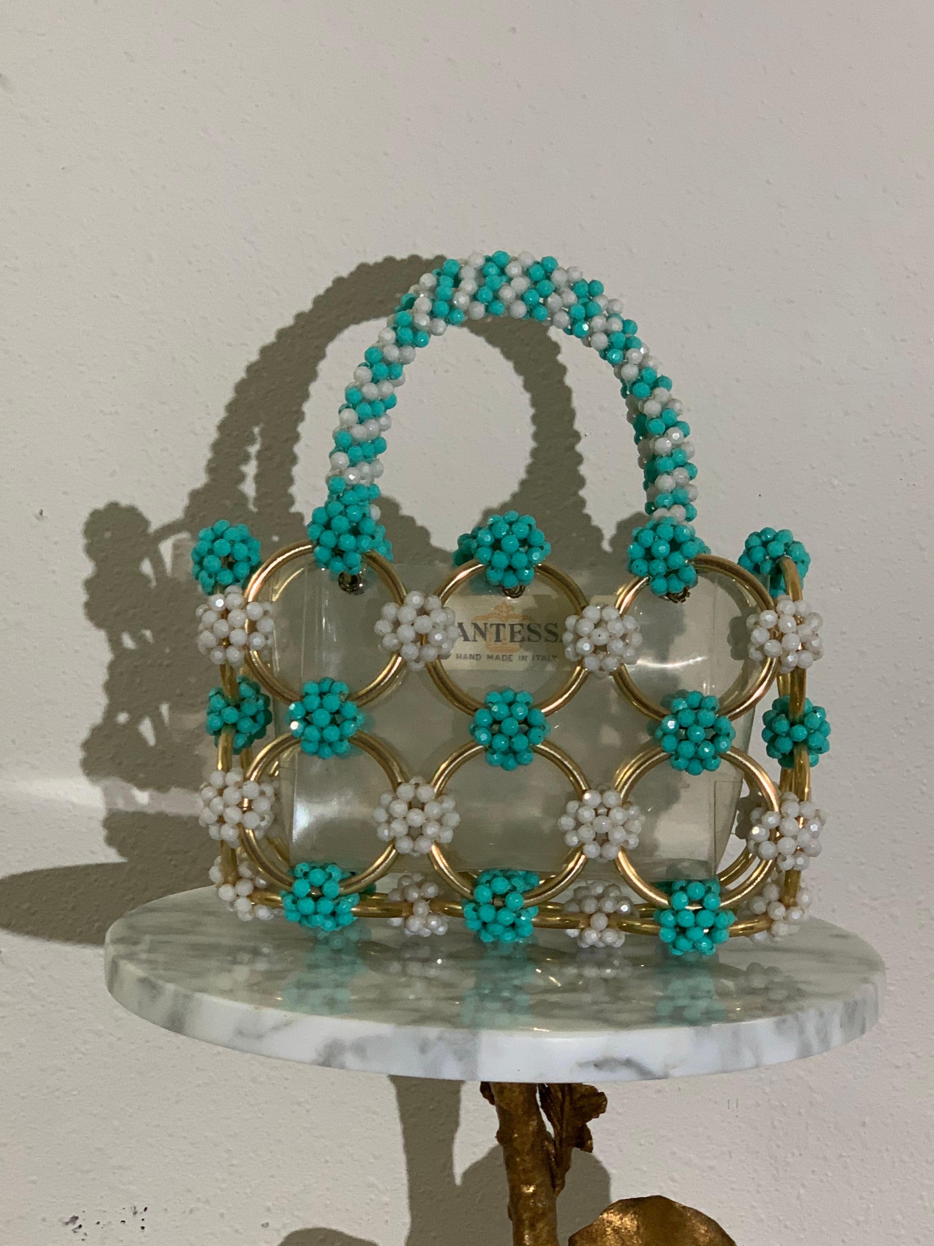 1960s Mod Mantessa Italian Turquoise and White Bead Balls Linking Gold Rings and Clear Lucite Mini-Tote: Beaded handle, No top closure. Fits cell phone perfectly. Measures 7.5 x 5. 