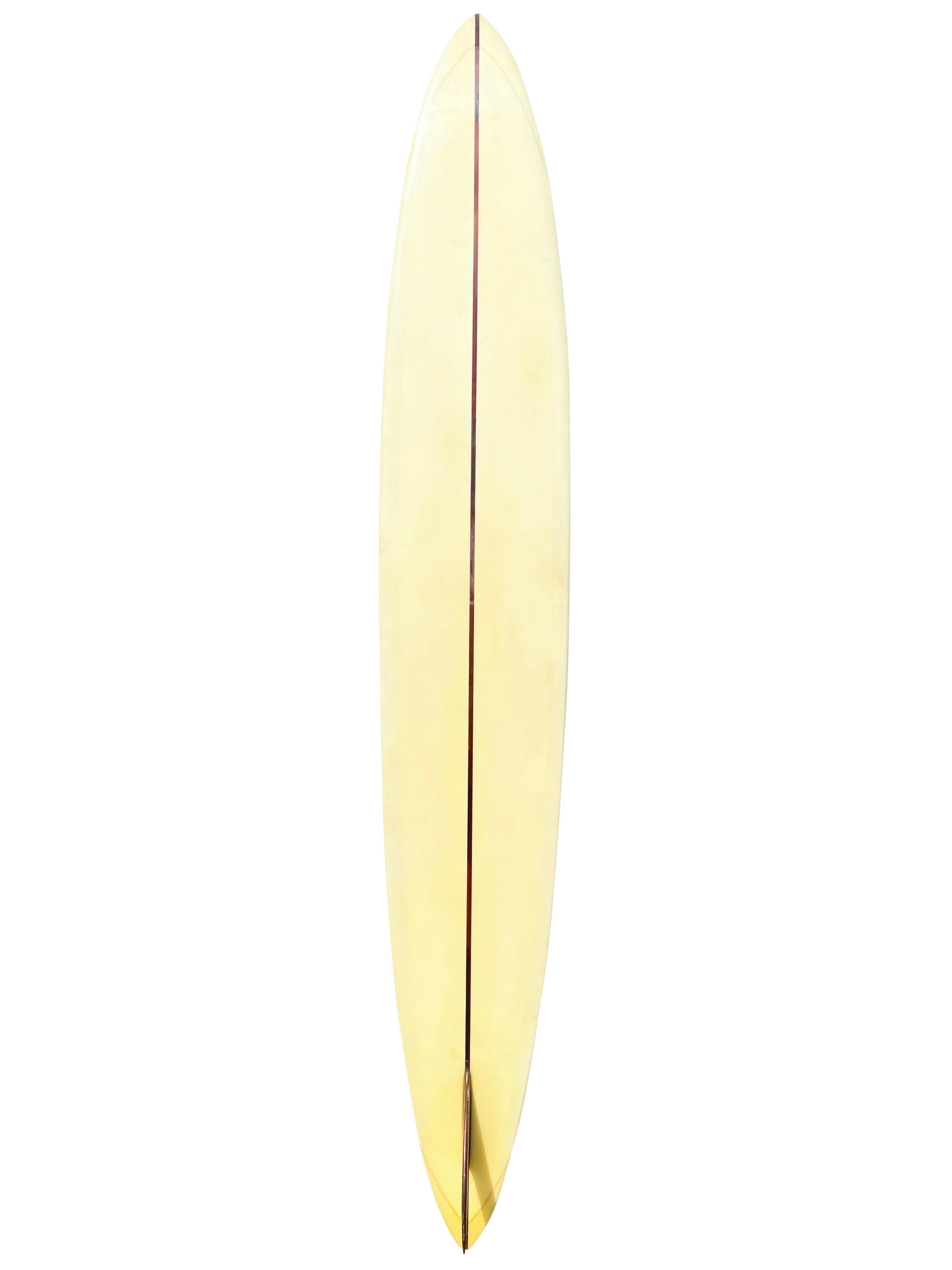 1960s Model Pat Curren big wave ‘Elephant Gun’ surfboard. Features an iconic late 1960s big wave design made for riding giants. Pintail shape with custom foam blank with old growth redwood single fin, redwood stringer, and extra strength Volan