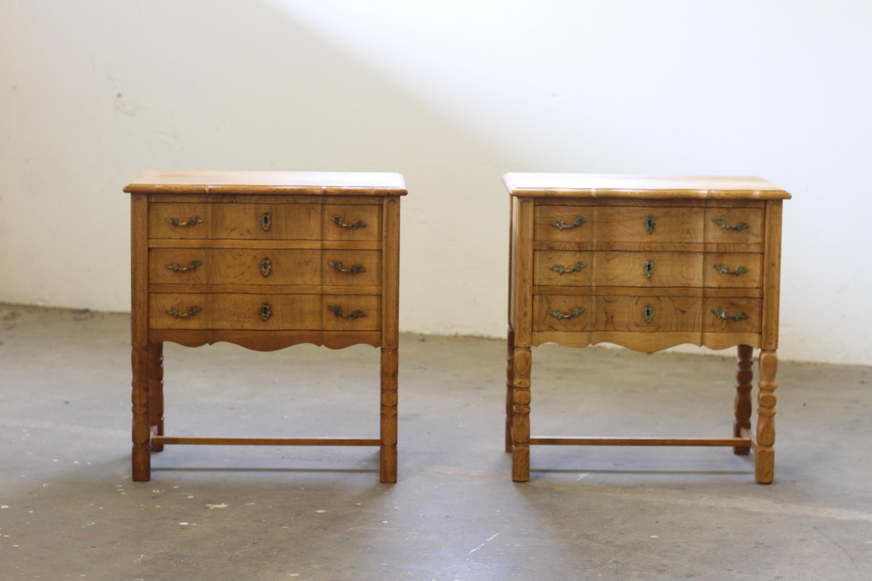 A pair of Oak bedside table / nightstand manufactured in Denmark during the 1960s/70s and often attributed to the renowned Danish designer Henning/Henry Kjærnulf. Kjærnulf is globally recognized for his unique fusion of Scandinavian Modern