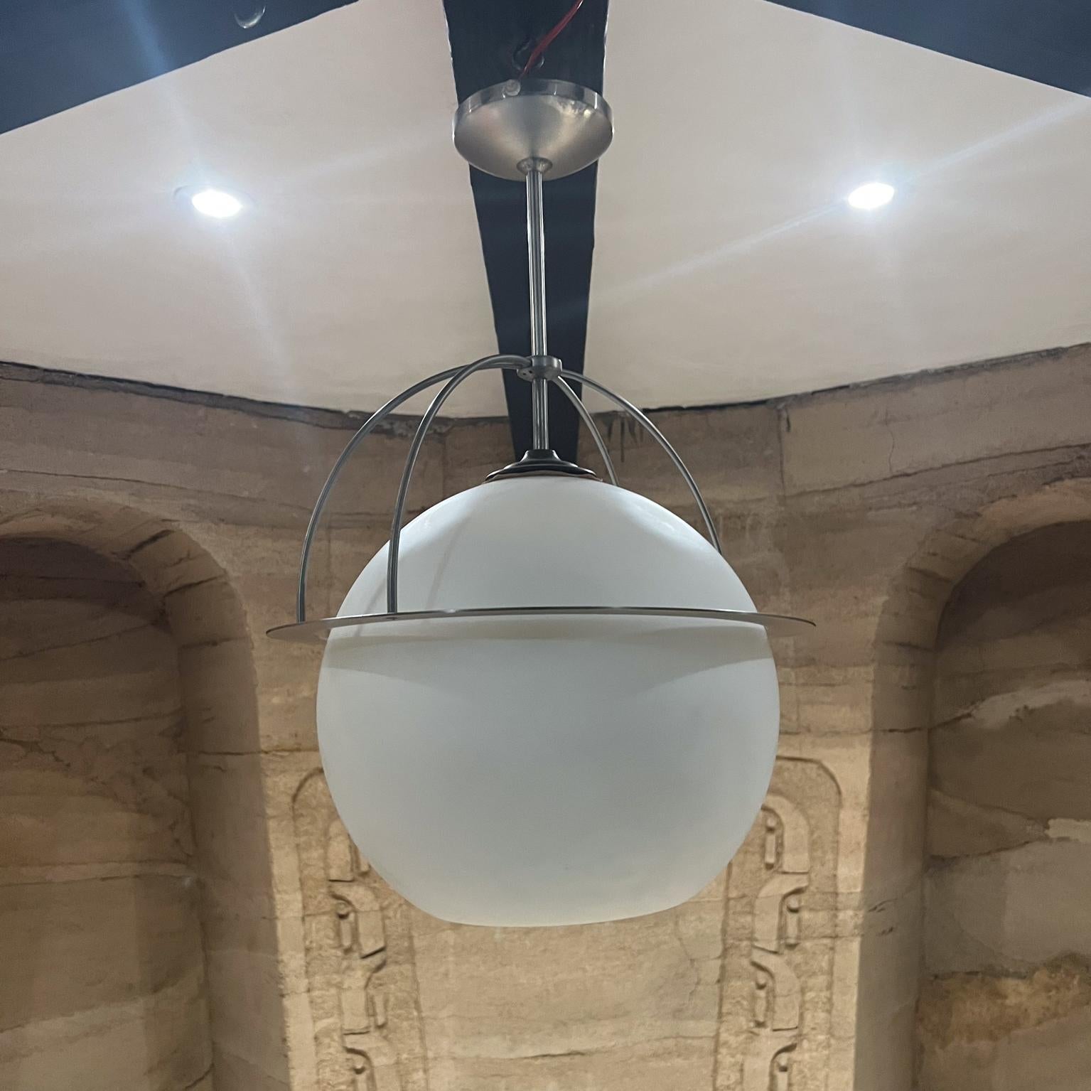 Modern Frosted Glass Globe Pendant Suspension Lamp
25 h x 16 diameter
Preowned unrestored vintage condition
Glass has a crack on top, hard to notice, must be mentioned.
Refer to photos.