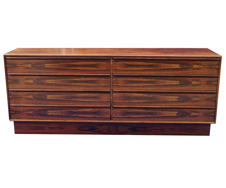 Stunning 1960's Modern Brazilian Rosewood Eight-Drawer Dresser Sideboard Chest Westnofa Furniture Norway. The back side also is finished in Rose wood. We also have the matching Highboy Gentlemens Chest in our other items, sold separately at the time