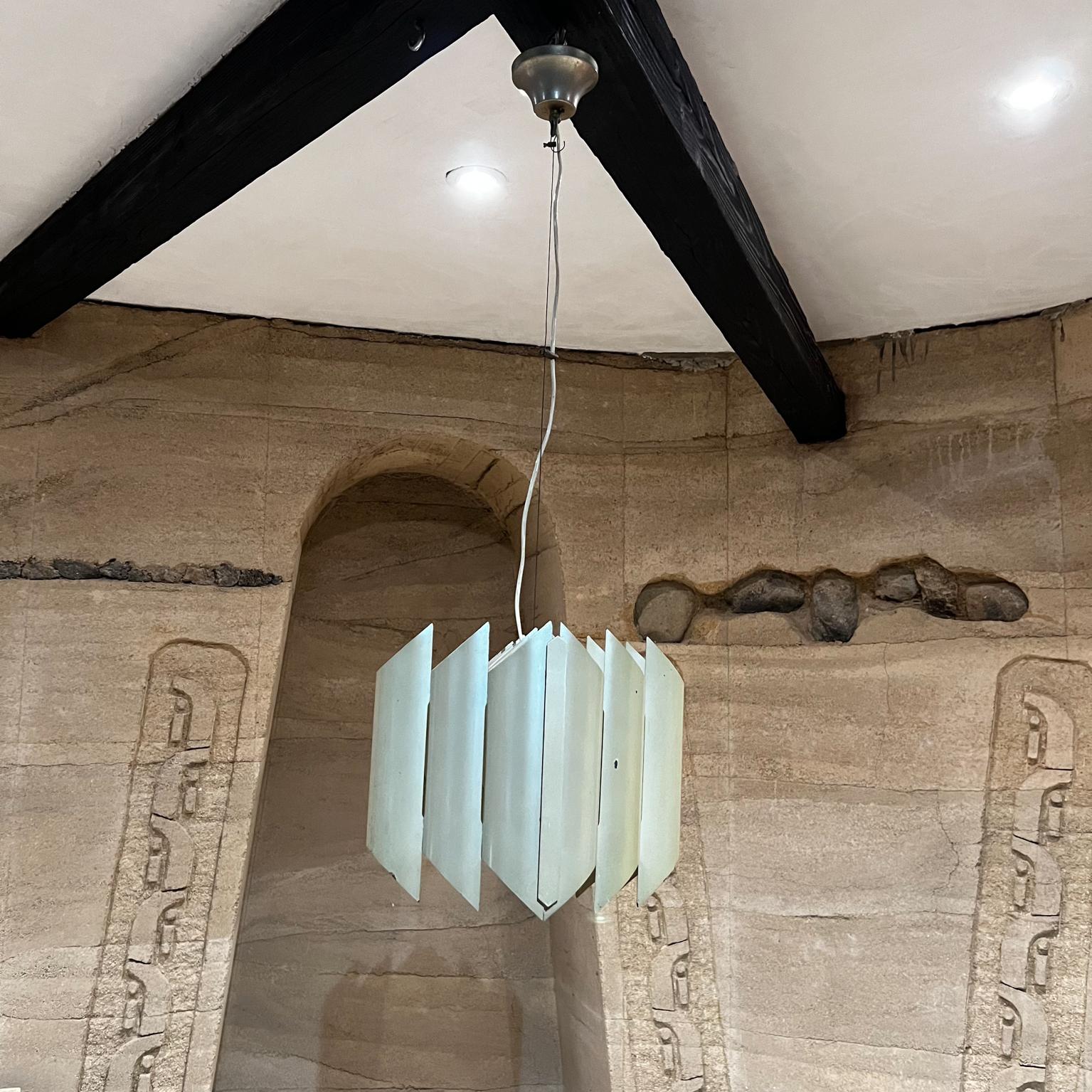 1970s, Tube cathedral chandelier pendant by Robert Sonneman.
Modern sheets of mother-of-pearl metal form tubes on this sculptural modern art chandelier.
Unmarked.
Measures: 38 tall x 10 x 10, fixture only 11 tall
Unrestored original vintage