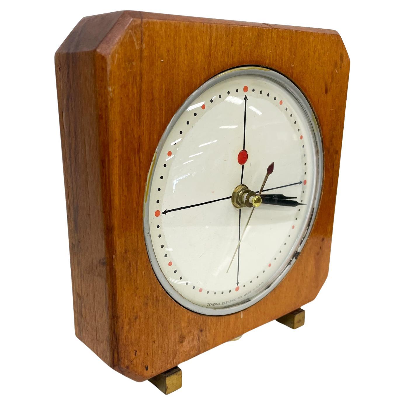 Clock
Mid-Century Modern wood clock with concave glass cover.
General Electric Company
Retrofitted from original electrical mechanism to new quartz battery operated movement.
Measures: 7.38 tall x 6.75 width x 2.25 depth
Preowned vintage