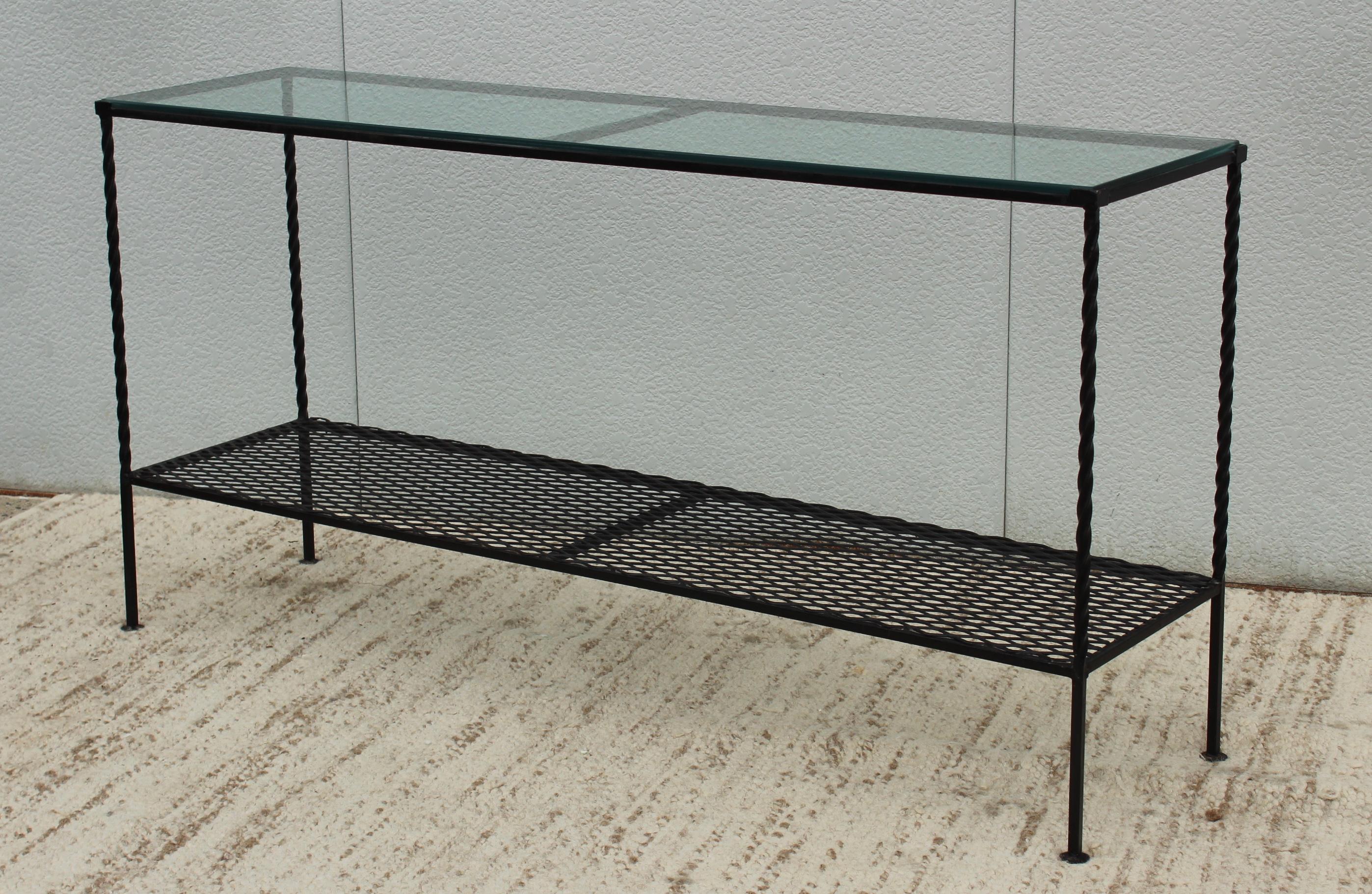 1960s Mid-Century Modern custom made two-tier wrought iron console with glass top.