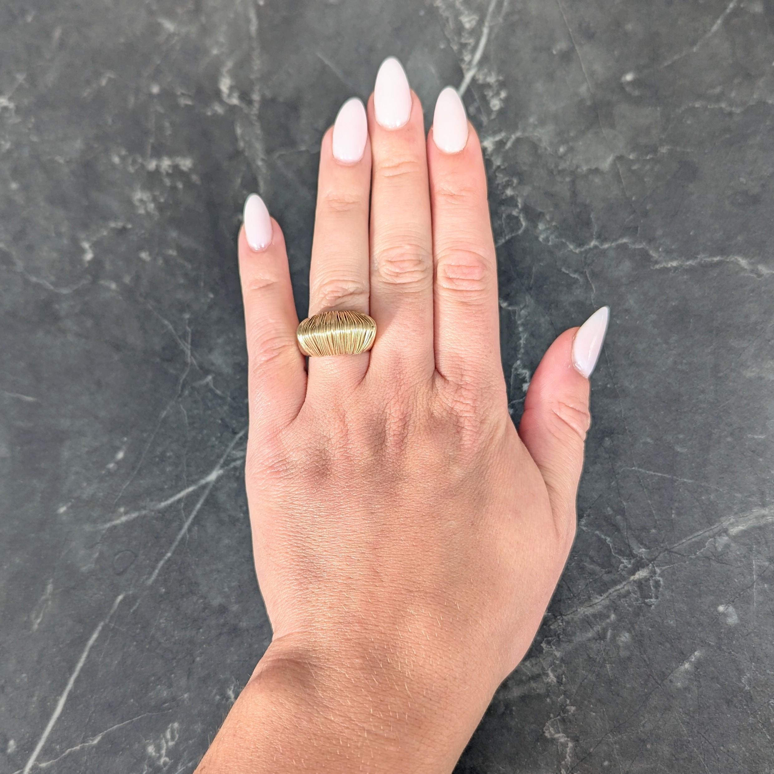 Designed as a domed form coming to a faceted point
Featuring a gold wire-wrapped mid-section
Flanked by flared high polished shoulders
Stamped for 18 karat gold 
Stamped for Italy
With maker's mark 
Circa: 1965
Ring Size: 5 1/2 and sizable 
Measures