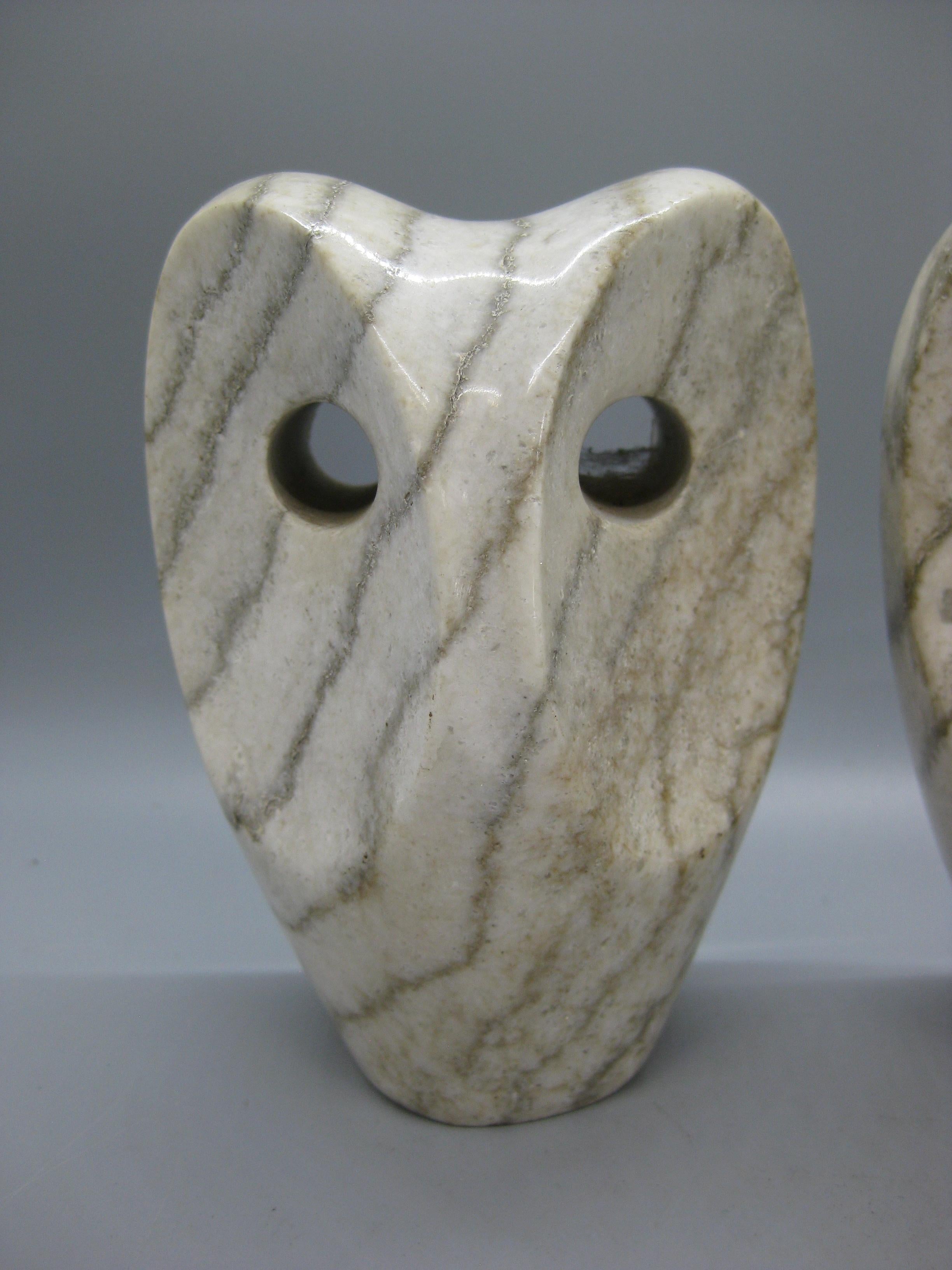 We are offering a wonderful pair of matching Modernist abstract Italian hand carved alabaster Owl figural bookends sculptures. These date from the 1960's. Made of solid alabaster. There are no marks or signatures. Wonderful form and design. Color is