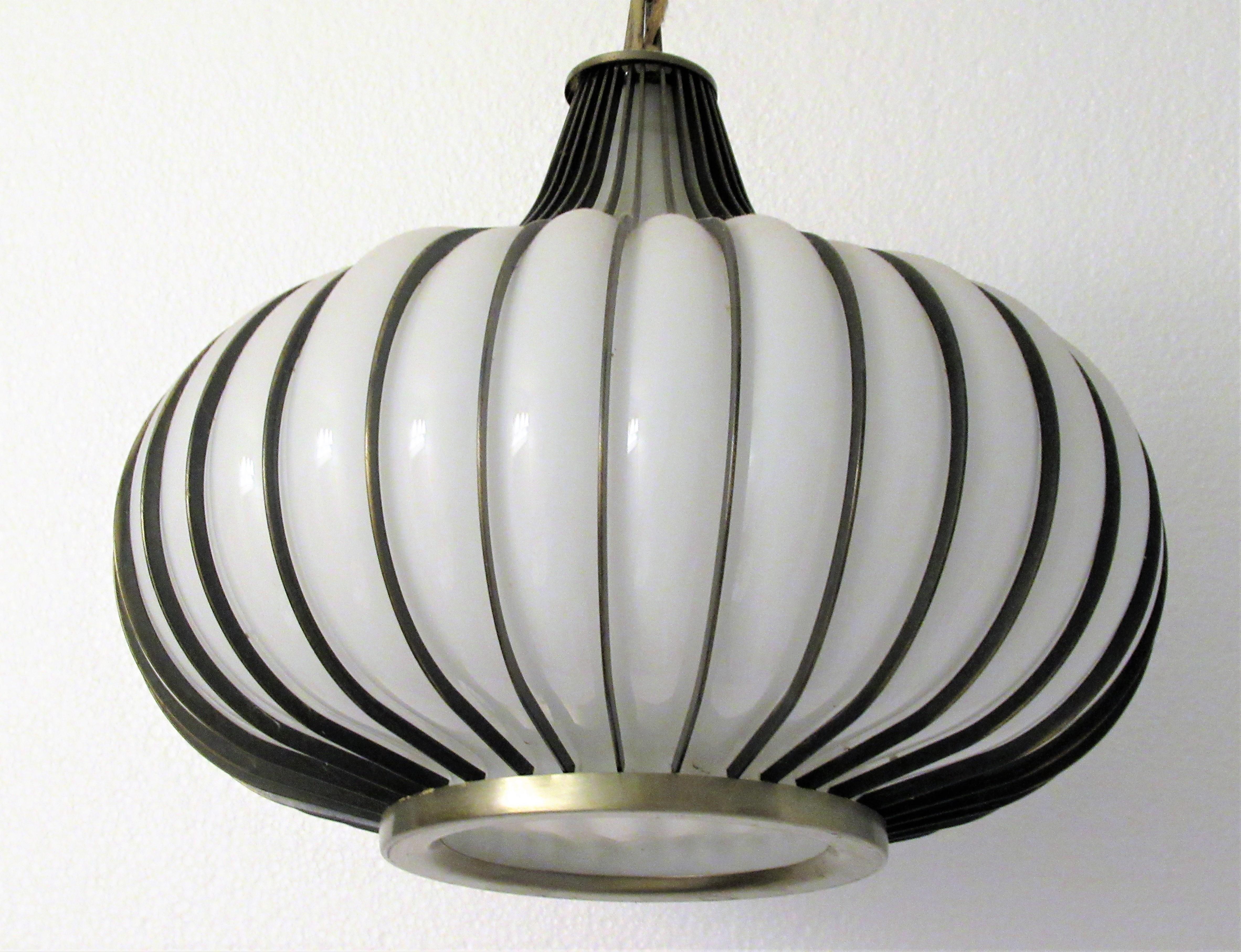 Brass-plated metal and blown white glass modernist ribbed onion form pendant chandelier by Lightcraft of California. An exceptionally beautiful sleek sculptural design, circa 1960-1970.