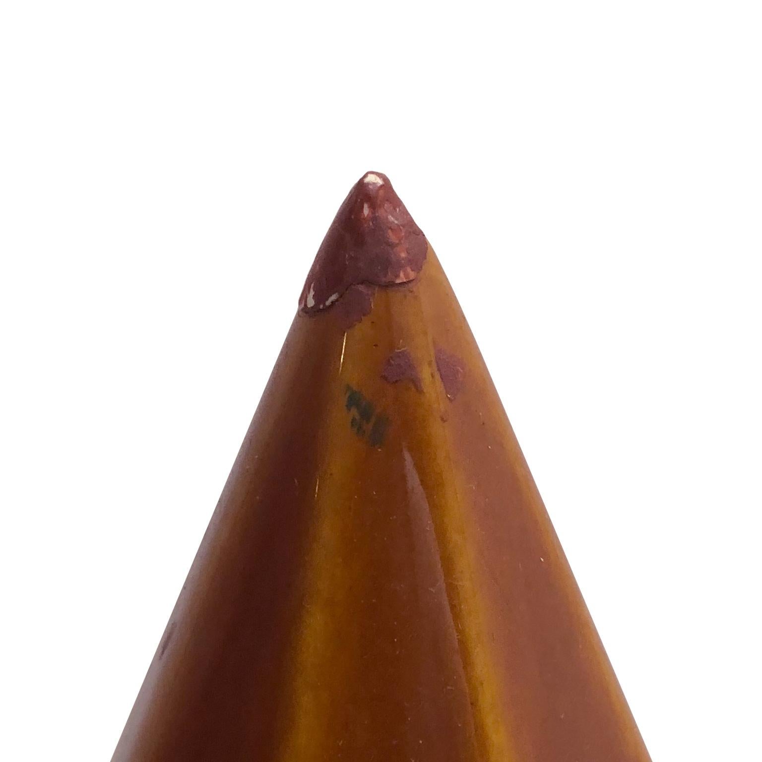 Modernist ceramic pyramid with auburn glaze. Initialled and dated on bottom, USA, 1965.

  