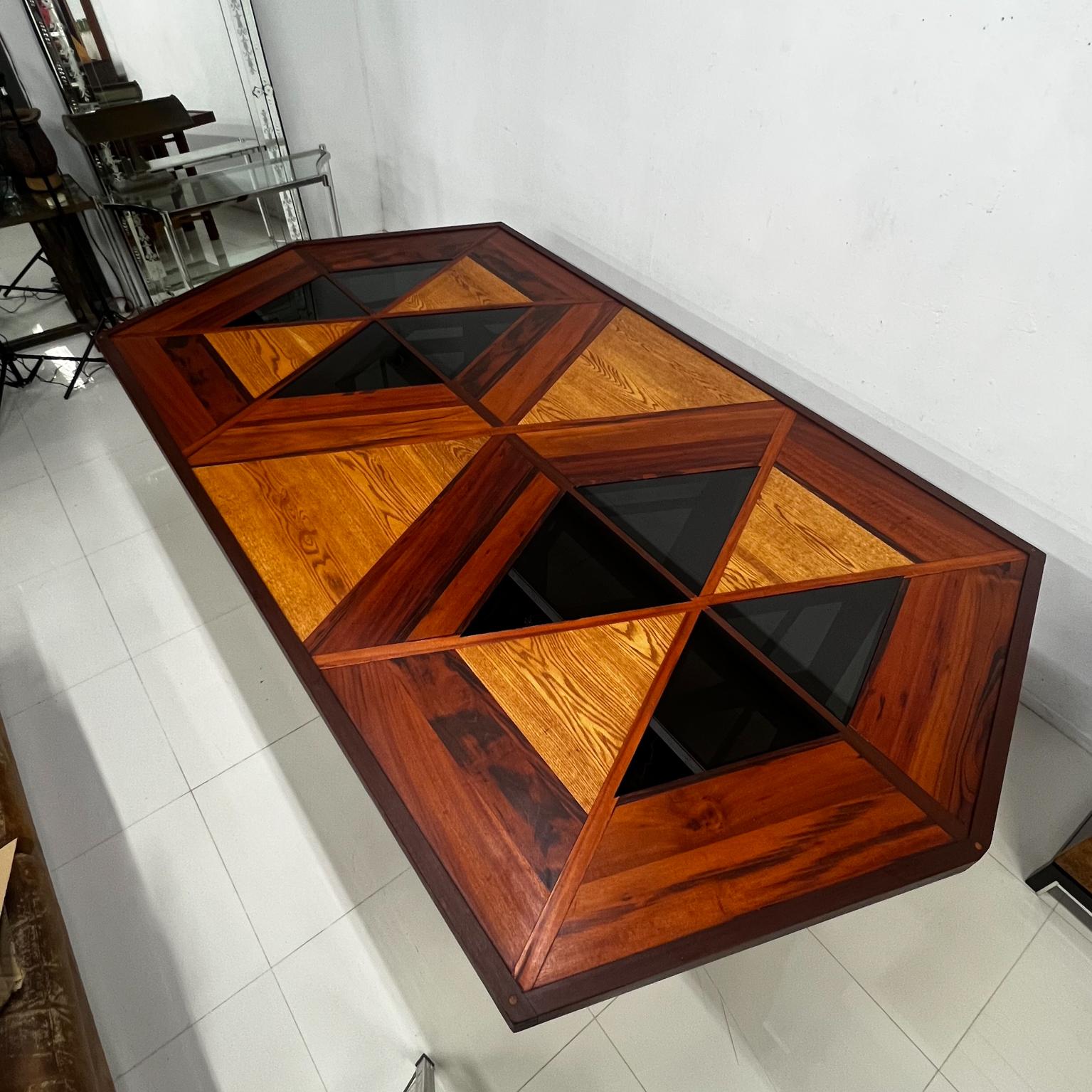 1960s Modernist Custom Design Dining Table Solid Wood Marquetry 
Elaborate wood inlays with a geometric design.
120 x 66 d x 32.5 tall knee clearance 30.25
Preowned original vintage presentation.
Refer to images recently provided.