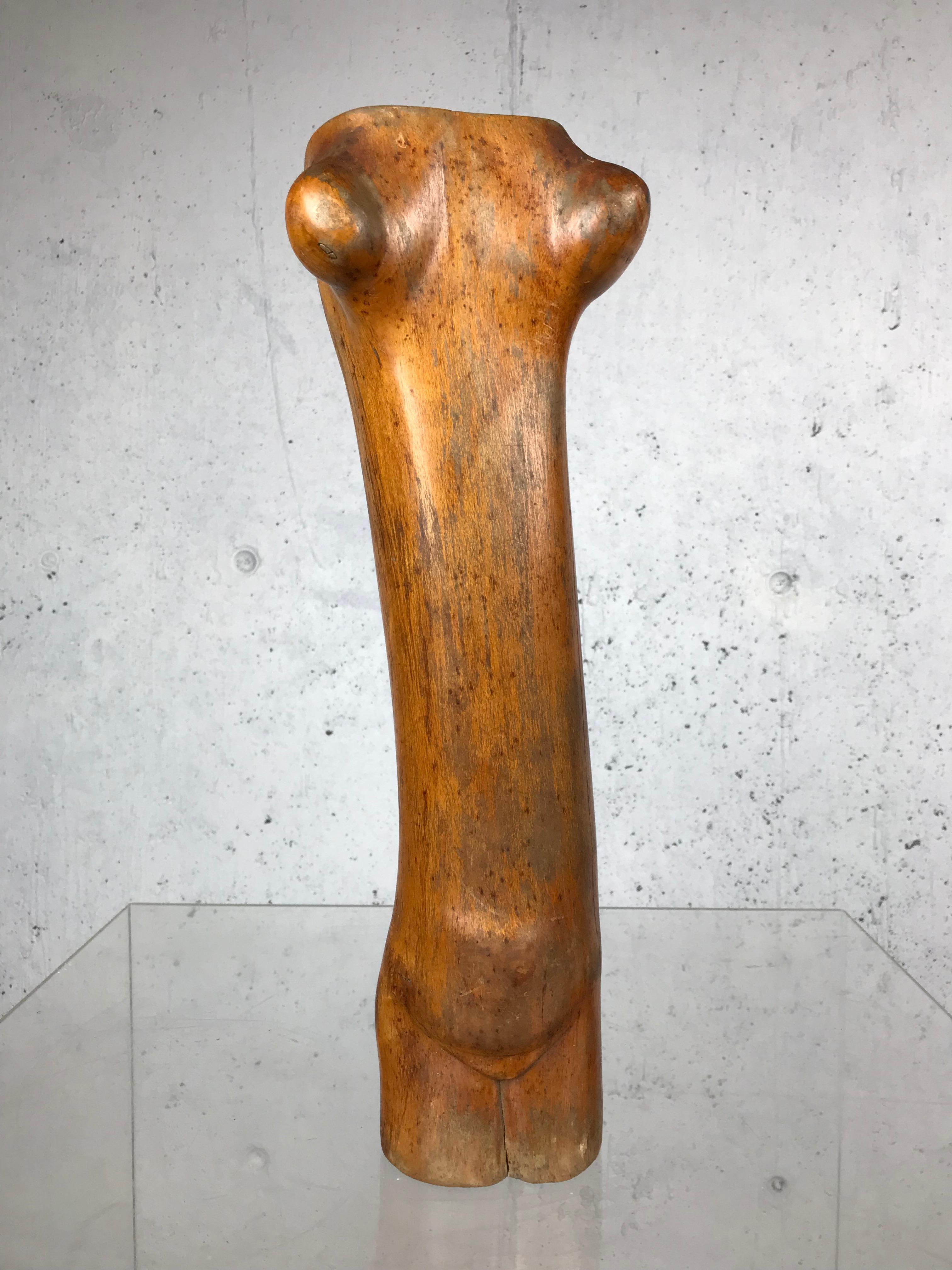 Well executed Modigliani style elongated female torso carved wood sculpture in untouched condition with beautiful patina, circa 1960s. Artist unknown. 15.58