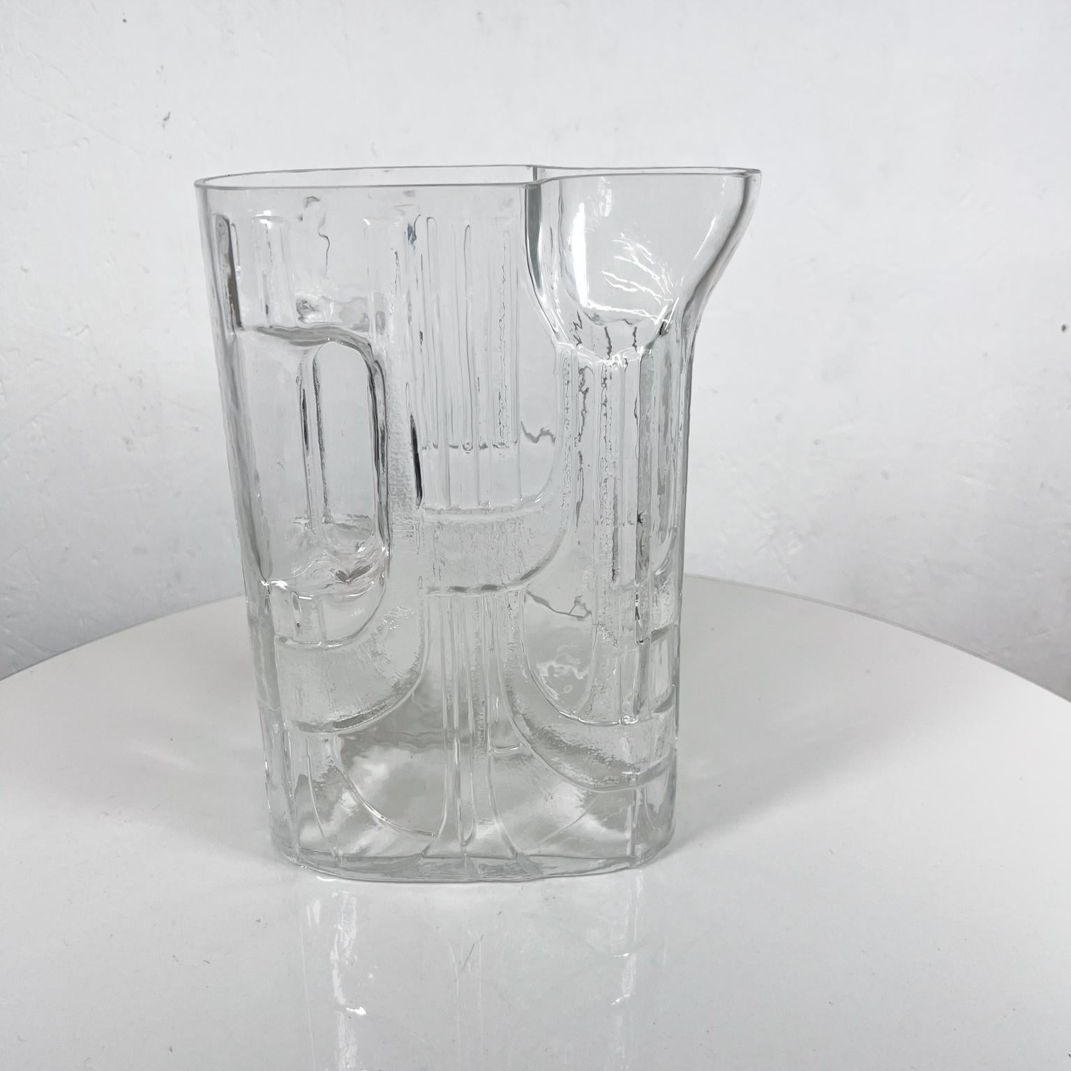 1960s Modernist Pitcher by C.J. Riedel for Riedel
Crystal Art Glass
Integrated Handle
Claus Josef Riedel
7 x 3.25 w x 10 h
Original preowned vintage, please refer to images.