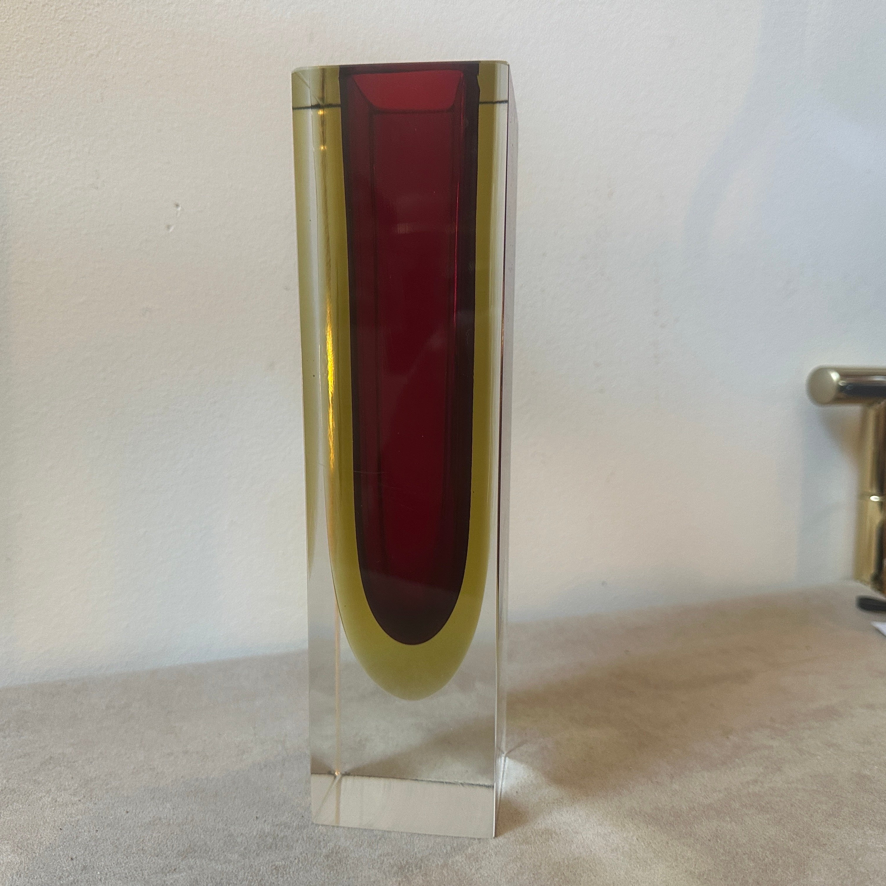 A square murano glass vase designed and manufactured in Italy in the Sixties by Seguso, it's in perfect condition. This Vase by Seguso is a stunning example of the innovative glassmaking techniques that characterized the mid-20th century Murano art