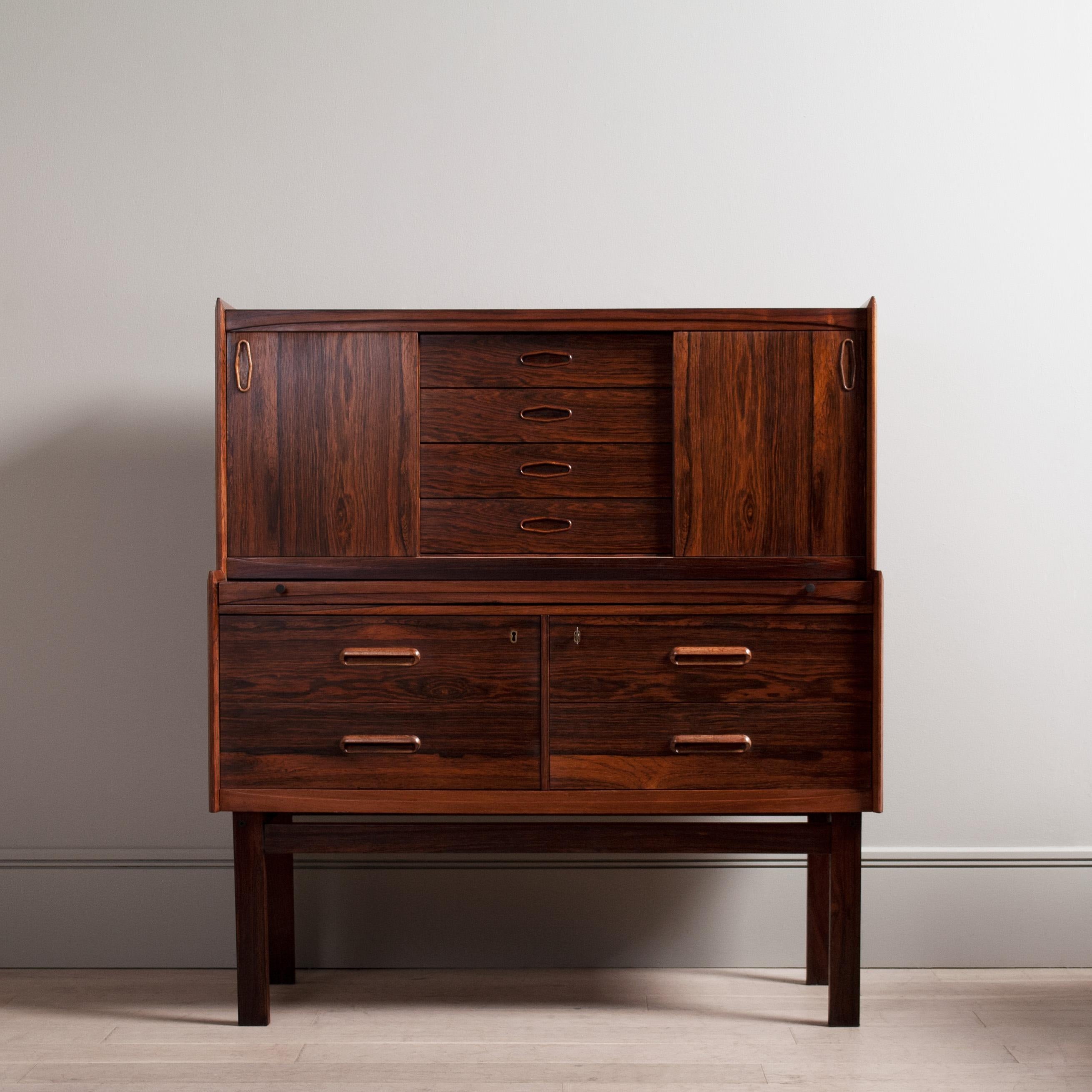A very fine quality secretaire - bureau by little known maker Baggaardens Mobler, CH madsen, denmark circa 1960. 
Wonderful design features and highly practical. Multi storage parts and pull out work surface. 
Great design details with a minimalist
