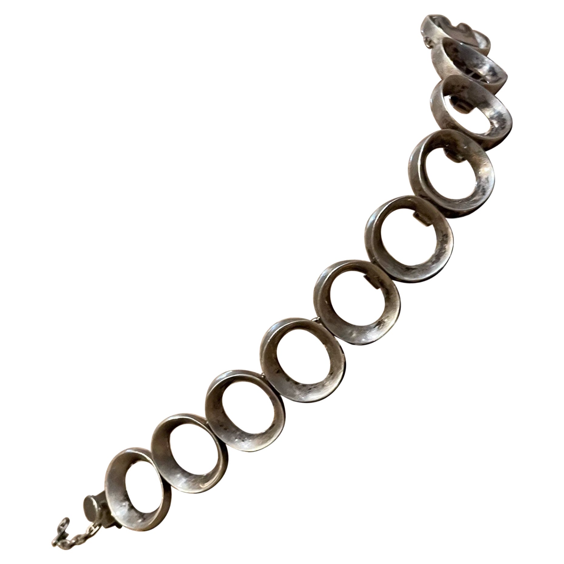 Gioielli latino-americani di Taxco del modernista Antonio Pineda bracciale a maglie messicane in argento sterling anni '60
Il timbro del produttore è presente.
Misure: 6,5 pollici di lunghezza x .75 di profondità x .13 di spessore
Condizioni
