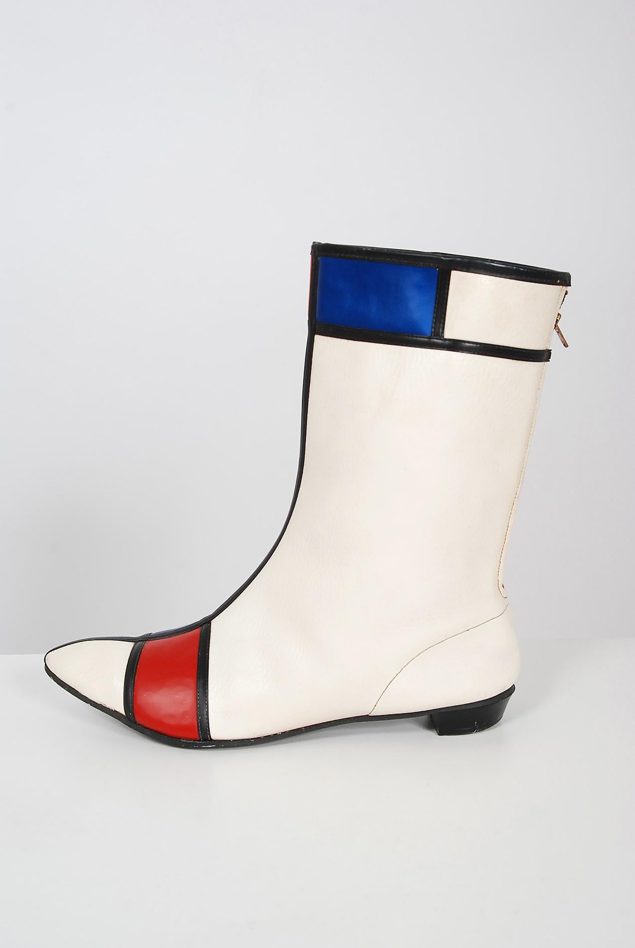 Breathtaking red, white and blue Hi-Brows Mondrian style boots greatly inspired by the Yves Saint Laurent collection of 1965. I love the unique block-color design and chic mid-calf length. The bold, brass zippers work perfectly. Mod boots that are