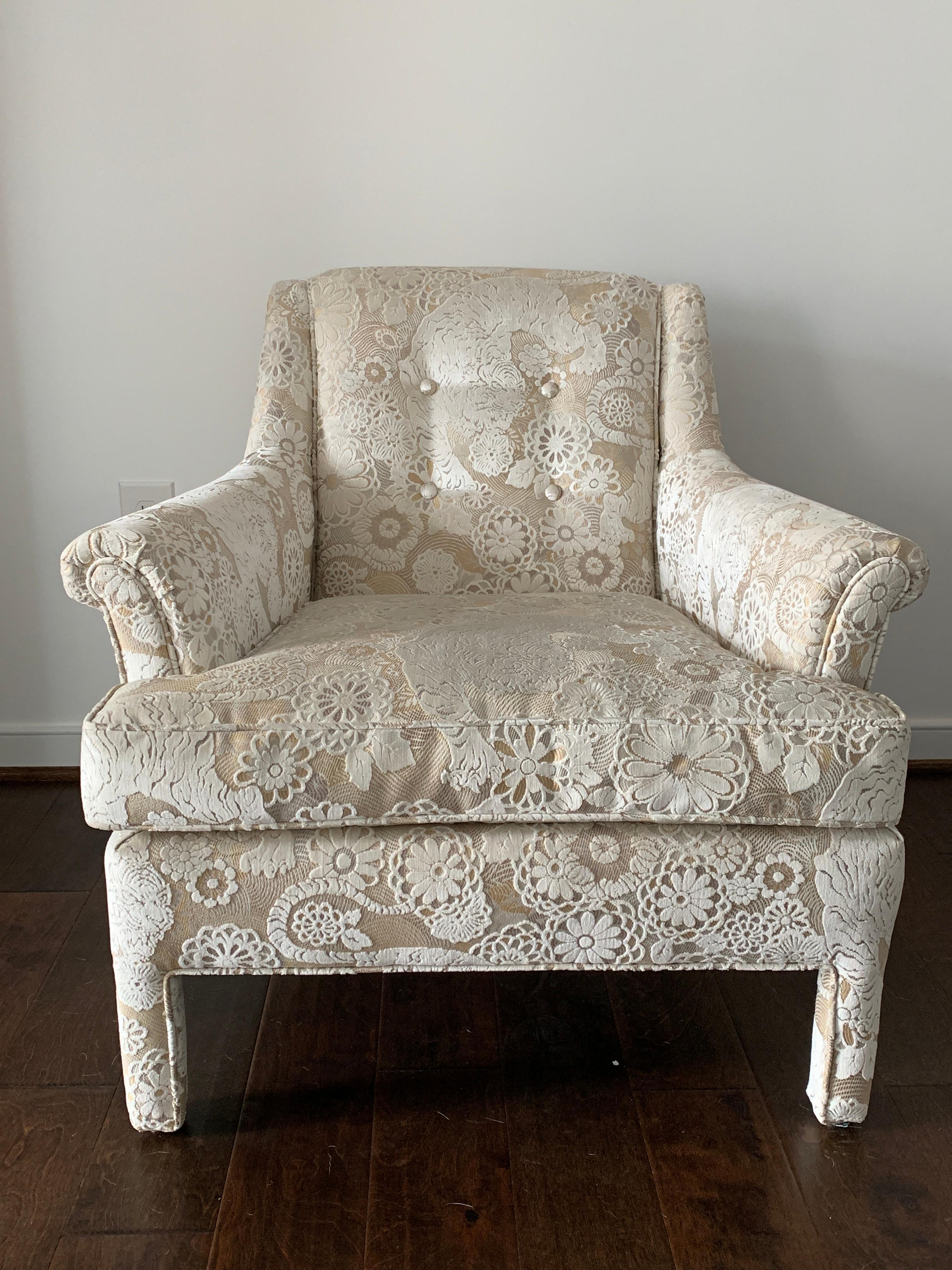 Offered is a fabulous, pair of 1960s monochromatic roll-arm armchairs. The pair have been professionally upholstered in Scalamandré's new Old World Weavers 'Siberian Tiger' velvet from the recent 'Tundra' collection, in the 'White Tawny' colorway.