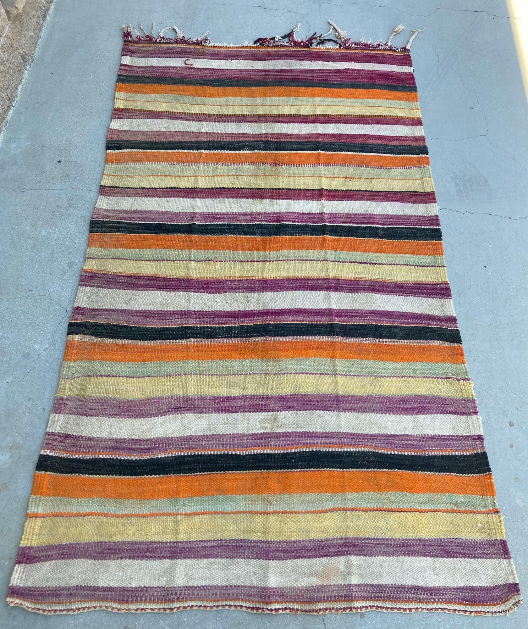 1960s Moroccan Tribal Rug, Hand woven North African Ethnic Textile Floor Covering.Vintage Moroccan flat-weave stripe Kilim rug. Hand crafted large size vintage Moroccan rug, handwoven by Berber women in Morocco for their own use. This ethnic rug was