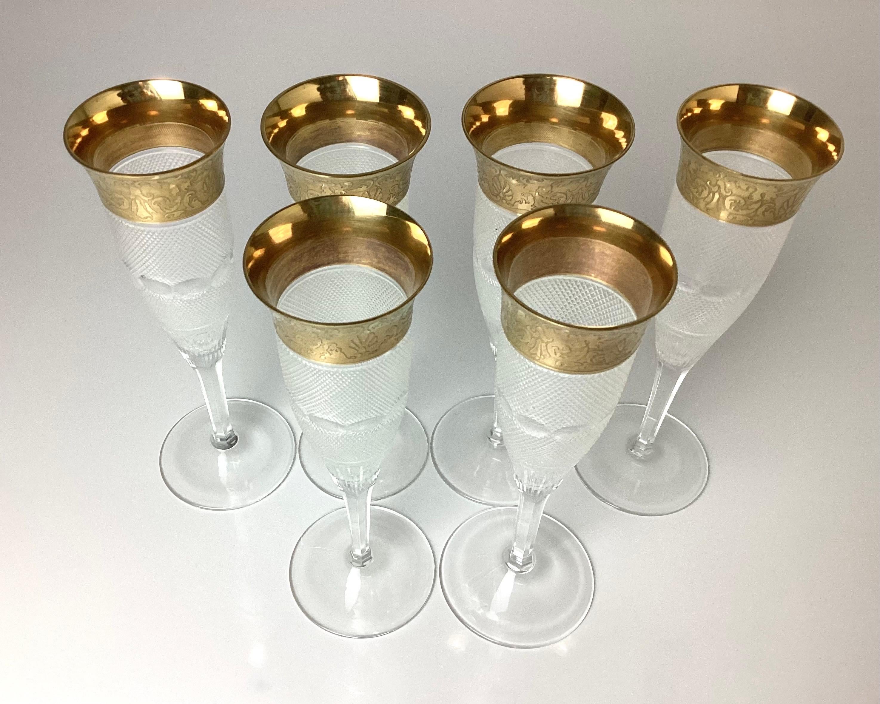 Moser Cut Crystal and Gold Splendid Champagne Flutes Set of 6. 7 3/4 inches tall by 2 3/4 inches in diameter at the base 2 1/4 inches diameter at the top. Wonderful condition with no chips to the cut crystal no gold loss and all are marked with the