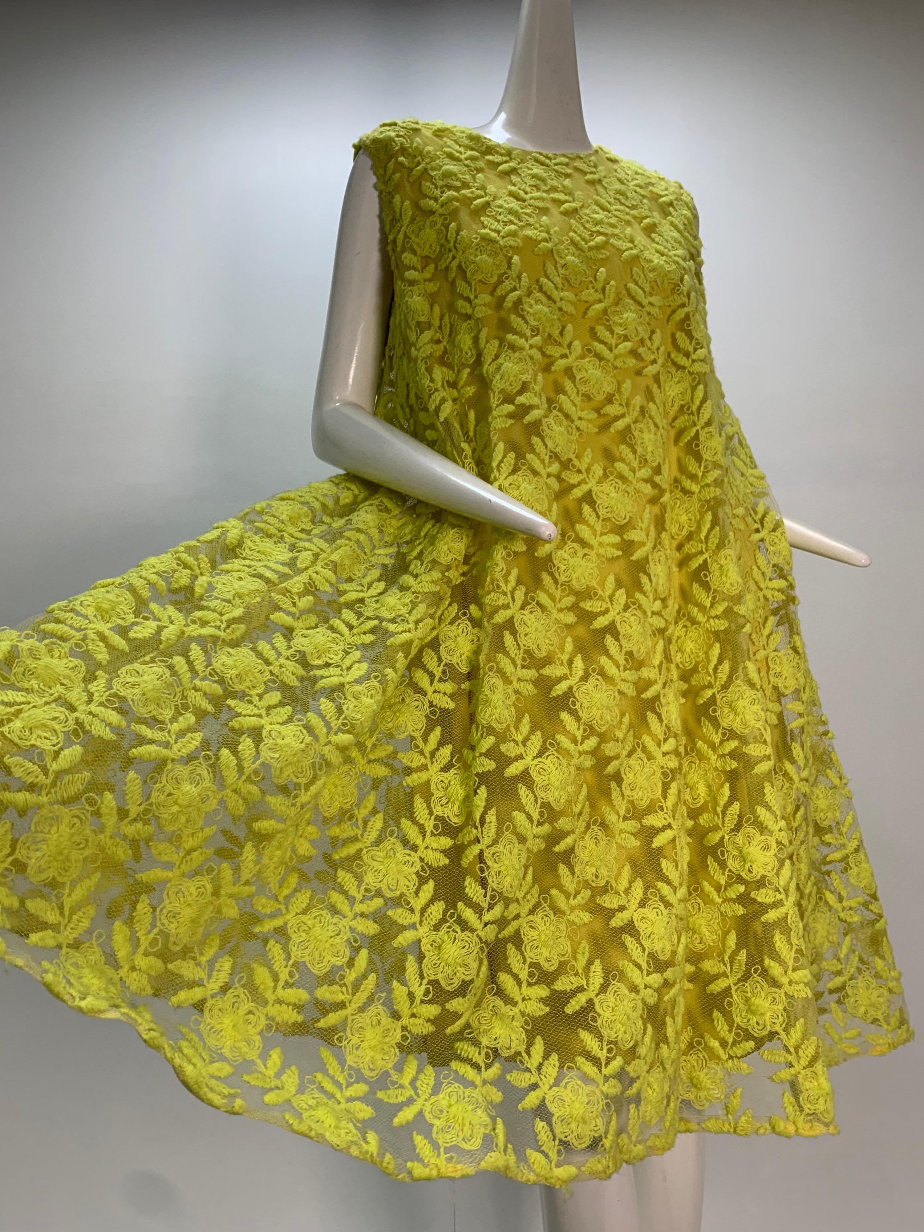 A fabulous Mod 1960s Mr. Blackwell neon yellow wide A-line swing dress: yarn-embroidered tulle layed over crepe under-dress. 