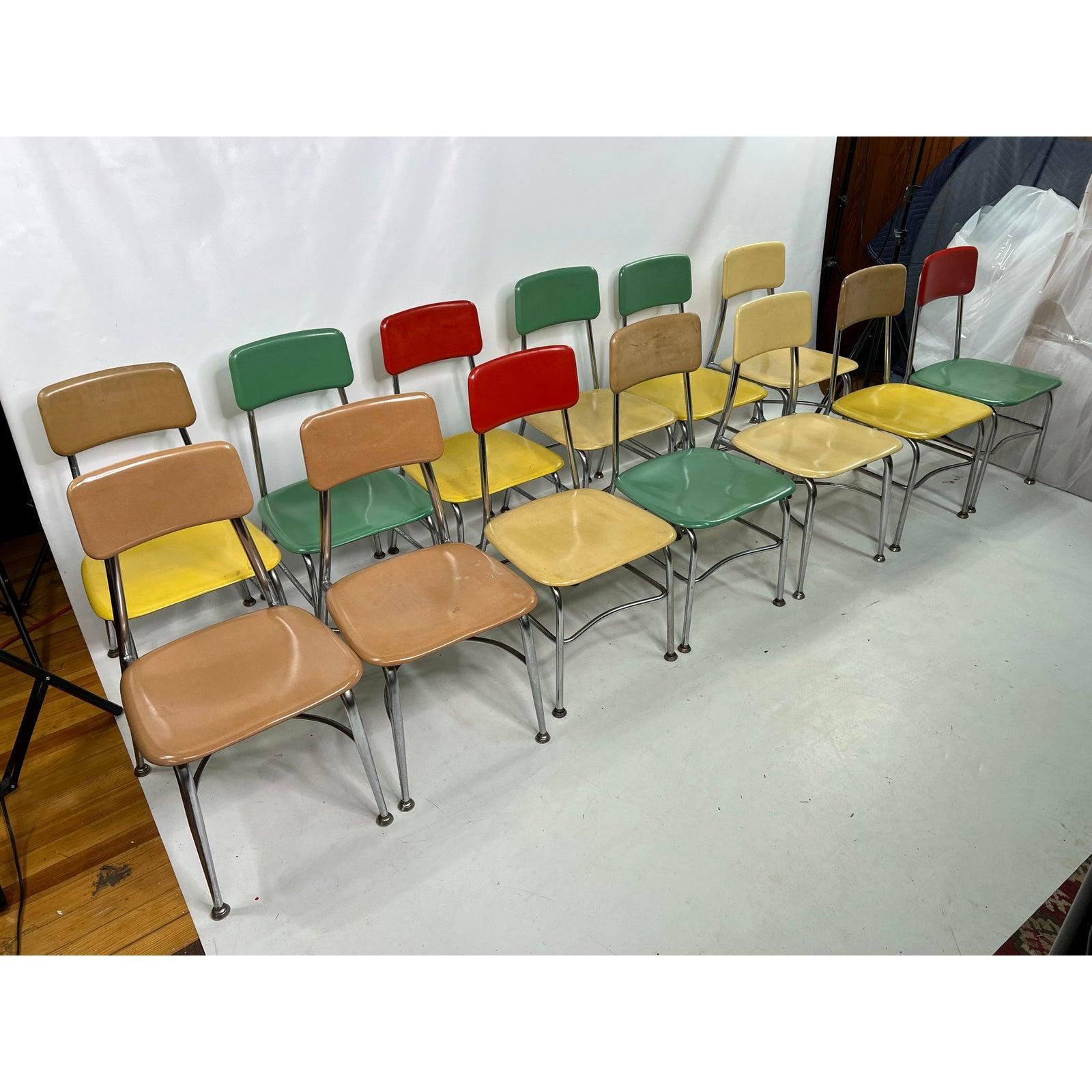 1960s Multi Colored Heywood Wakefield School chairs - Set of 13

Four of the chairs have a slightly different design and height.