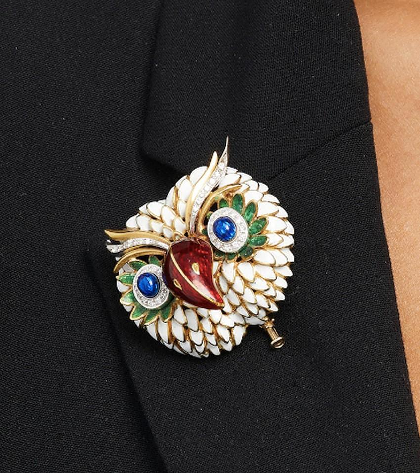 A charming Owl Brooch crafted in White, Green and Red Enamel, with Diamond Eyes. 
Made in Italy, circa 1960.