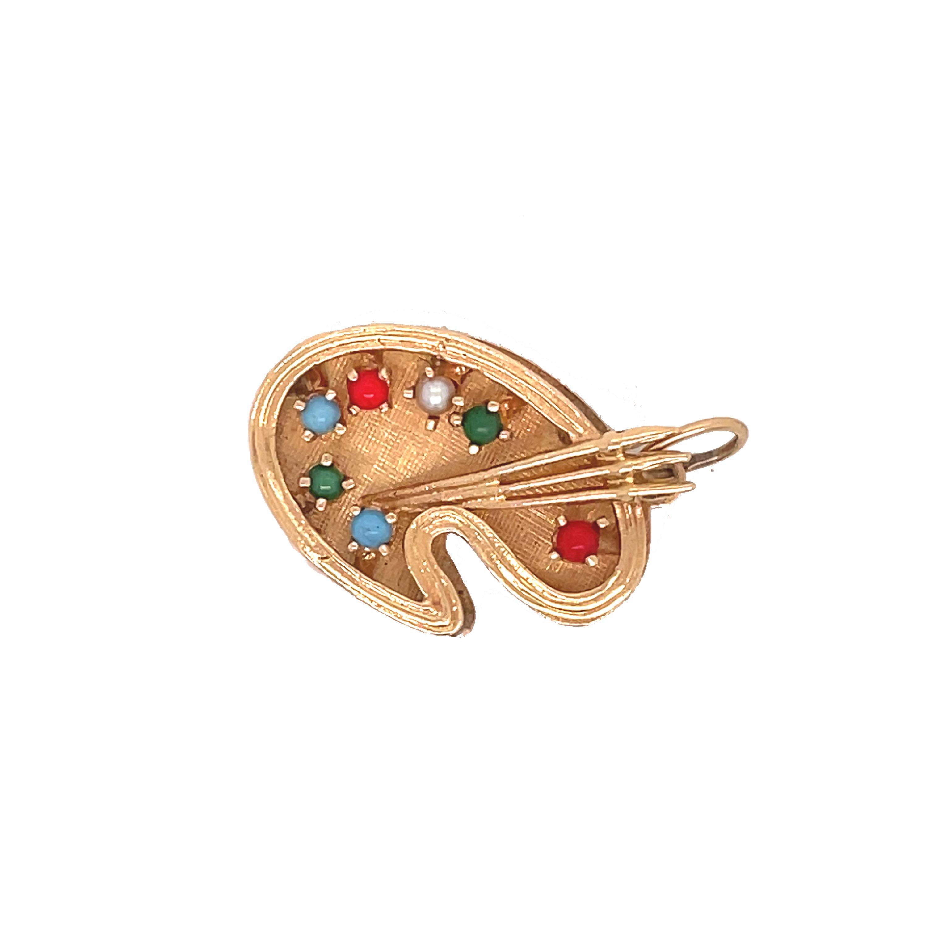 This lovely charm from the 1960s set in 14K yellow gold depicts a multi-stone artist's palette! You indeed won't find a charm quite like this one! You can genuinely see the craftsmanship and detail that went into creating this item, from the etched