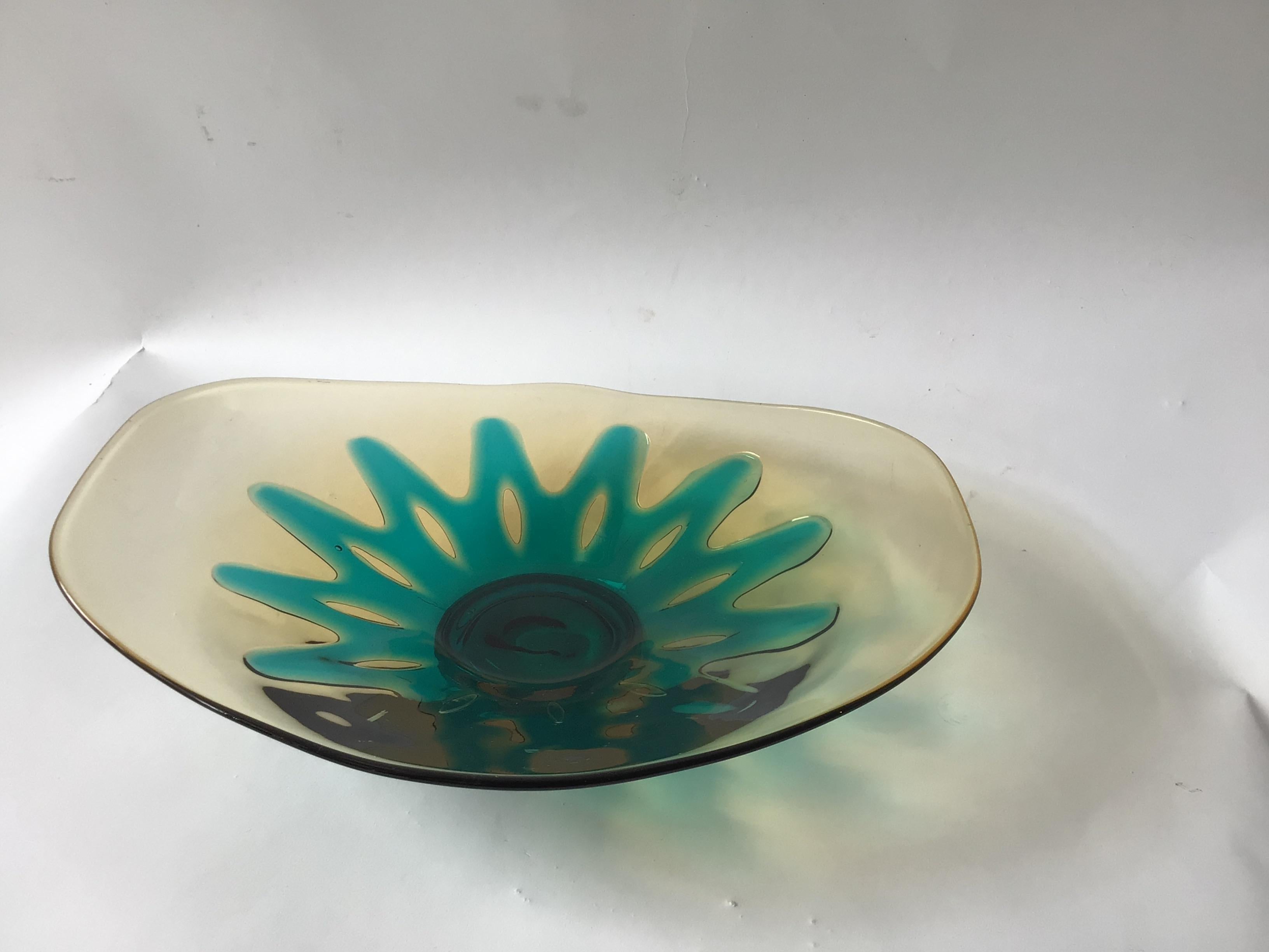 1960s Murano glass bowl with a sunburst design in the middle.