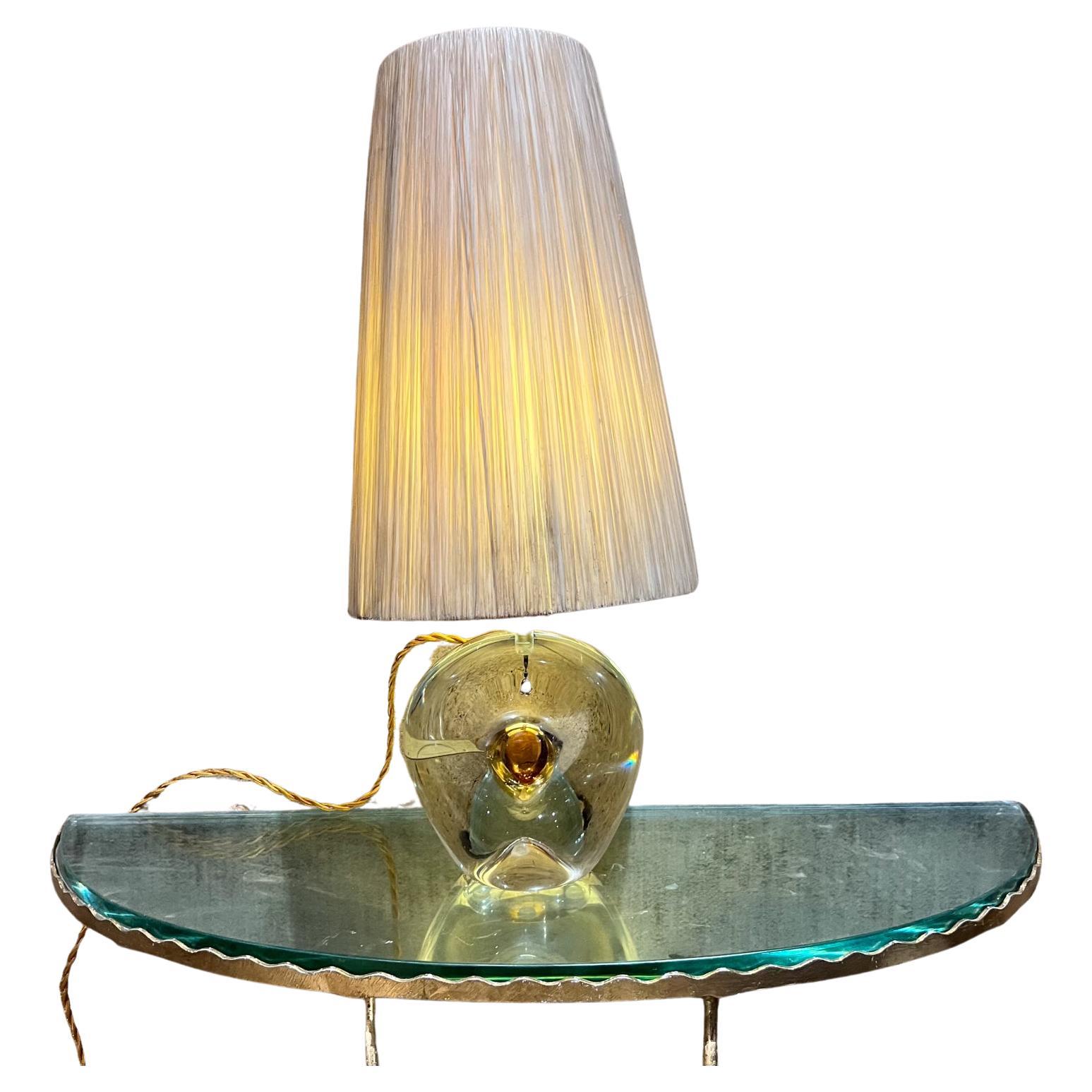 AMBIANIC presents
1960s Murano Art Glass BAK Table Lamp Lamparas Mexico City
lovely sculptural shape with color
Maker stamped.
21.25 h x diameter at widest point
Shade 13.75 h x 5.5 diameter at top
Preowned vintage rewired, new socket, new twisted