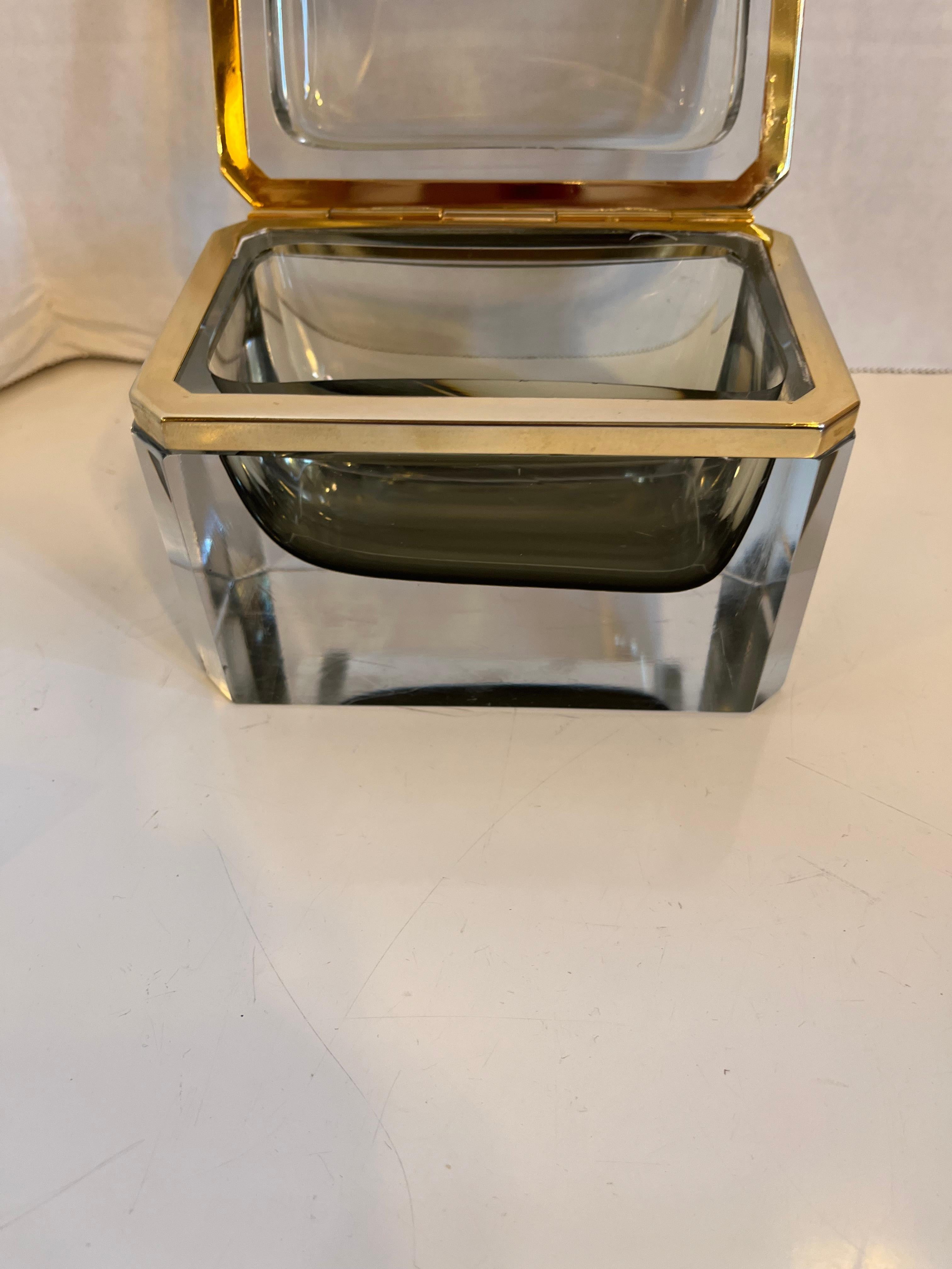 A striking vintage bronze-mounted clear thick Murano glass casket attributed to Sommerso having a smoked glass interior.