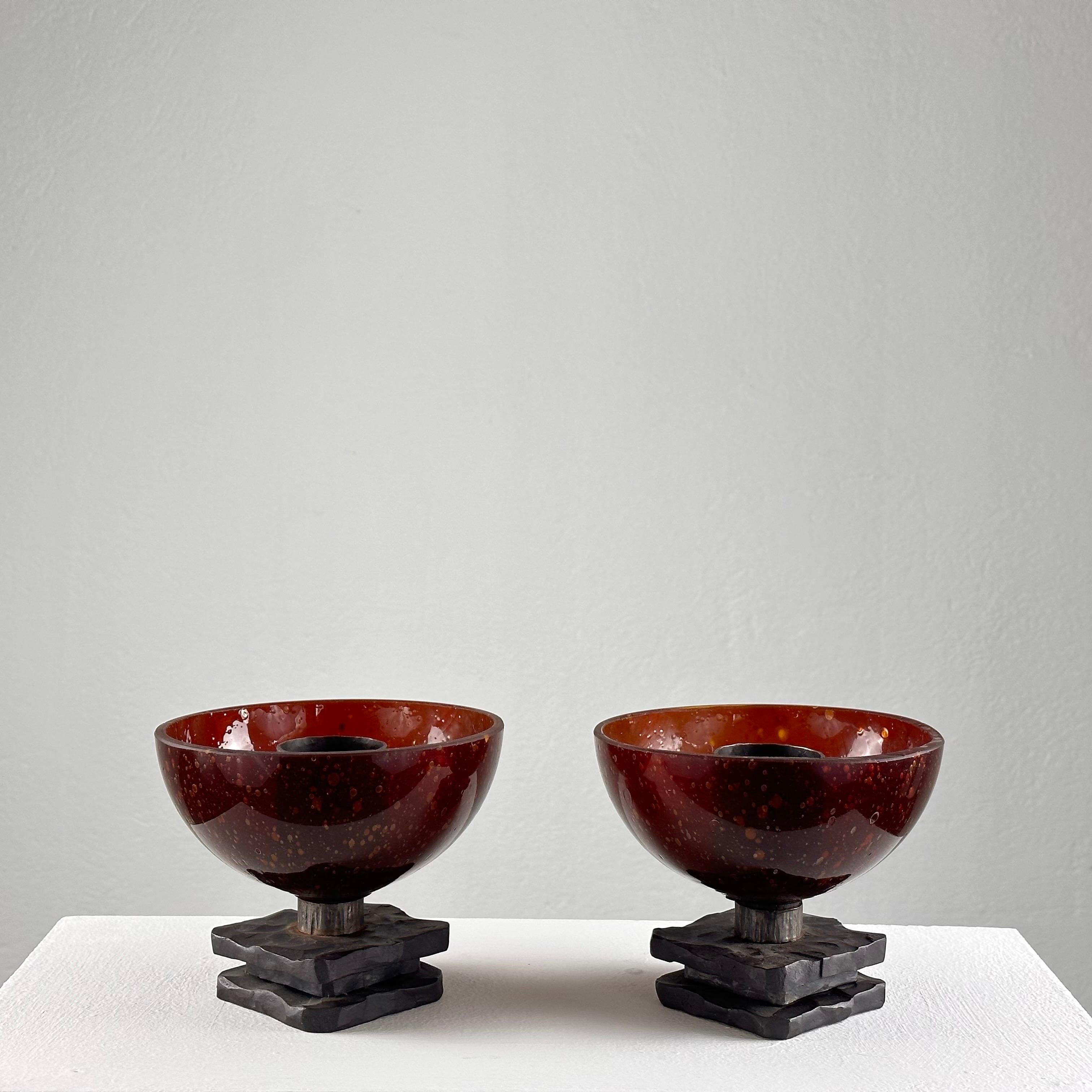 Illuminate your space with a touch of mid-century elegance and artisanal flair with this pair of splendid Brutalist candle holder cups crafted from Murano glass. Dating back to the 1960s, these candle holders are a testament to the mastery of