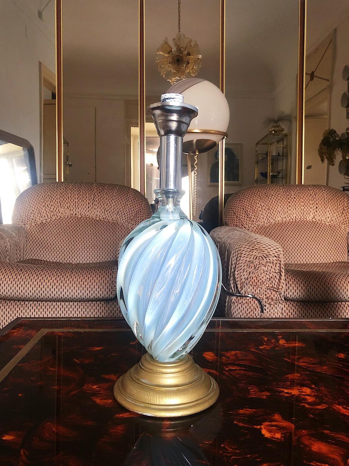 Superb ice blue Murano glass table lamp, made by Barovier & Toso in the 1960s
The lampshade is not included. 

Dimensions: height with lampshade: 70 cm height without lampshade 50cm
Materials and Techniques: chrome, glass, wood.

